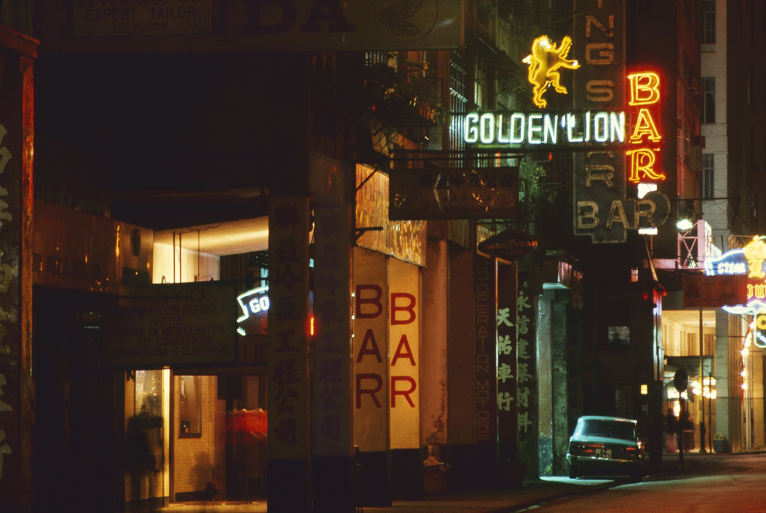 Greg Girard, Golden Lion Bar, Wanchai, Hong Kong 1974, Courtesy of Blue Lotus Gallery
