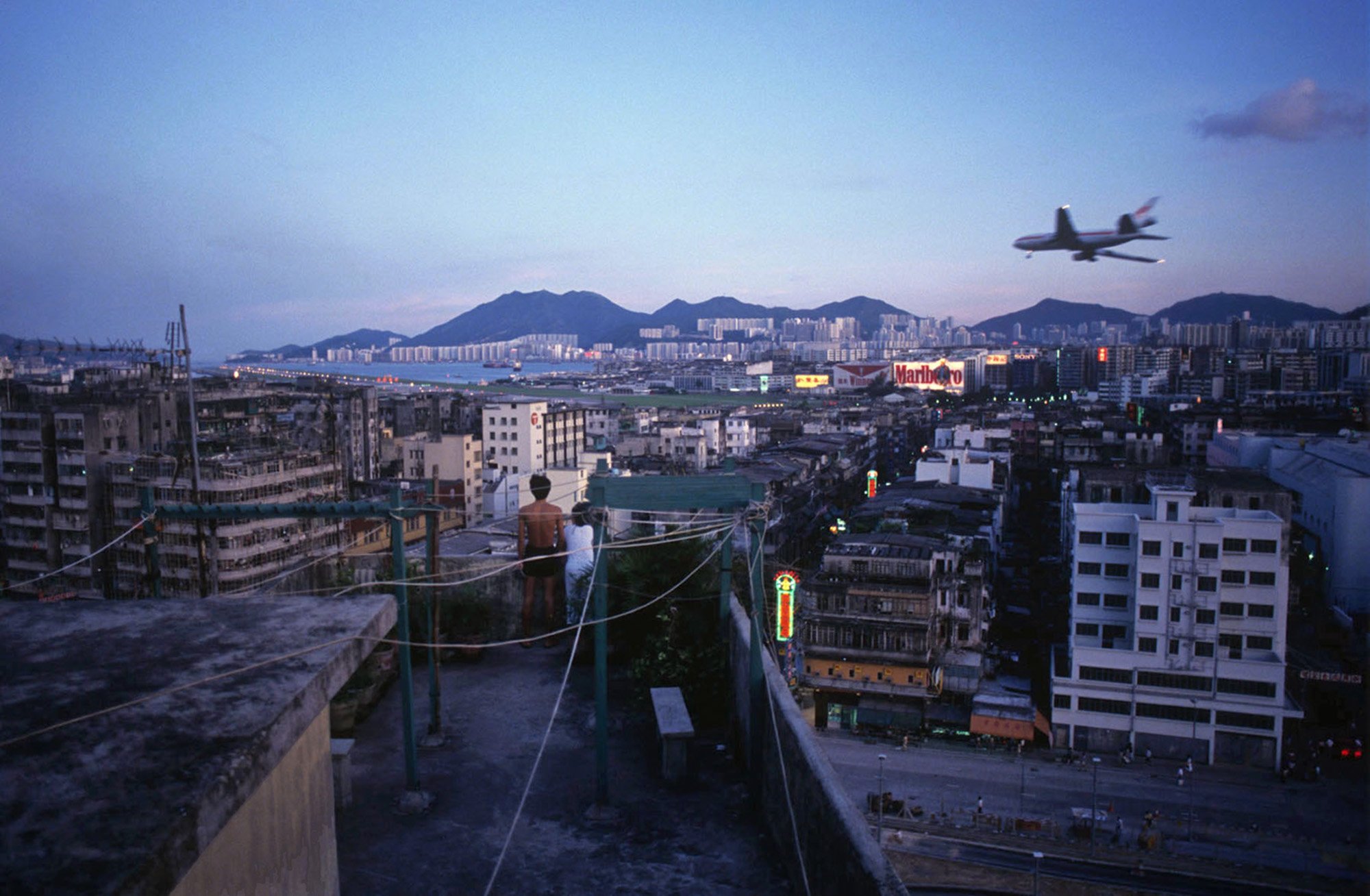 Greg Girard, Rooftop and Plane, Hong Kong 1989, Courtesy of Blue Lotus Gallery.jpg