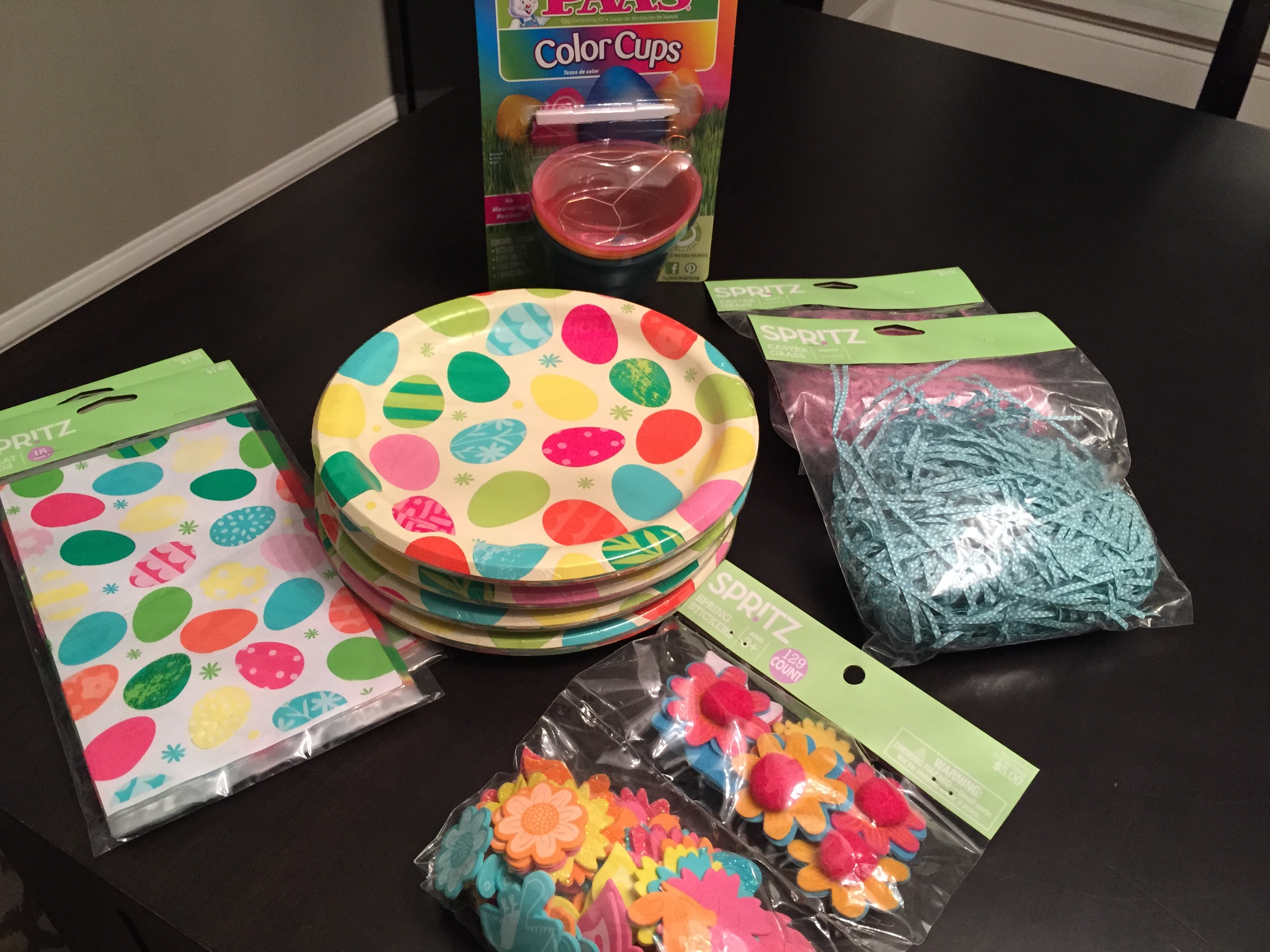 I chose Spring Stickers instead of Bunnies so I could use all throughout spring this year or next and I picked up 6 packs of paper grass for next year's baskets or any type of gift bag or box.