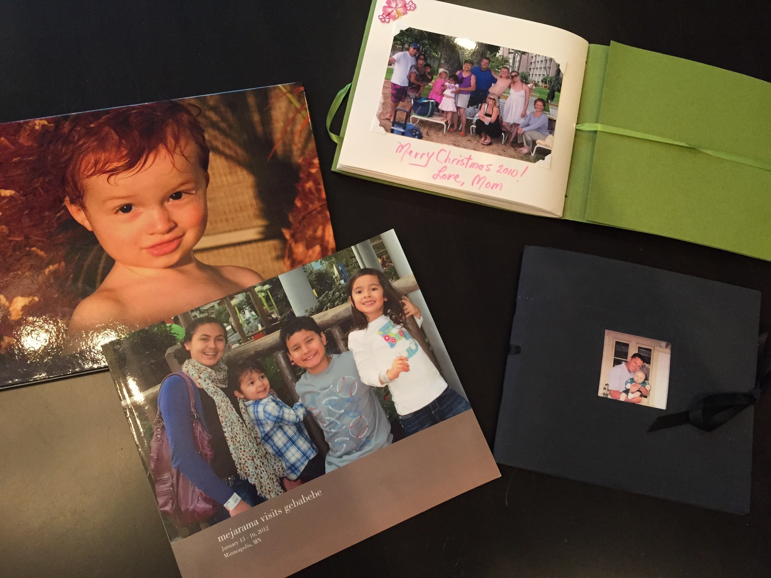 An album of Chase given to me for my birthday. A scrapbook from my mother-in-law as a Christmas/thank you gift for a great trip to Kauai. A momento from The Williams capturing their visit to MN. A scrapbook of a week in Laguna Beach over 12 yrs ago made by sister-in-law Camille. All of these gifts of photos are timeless.