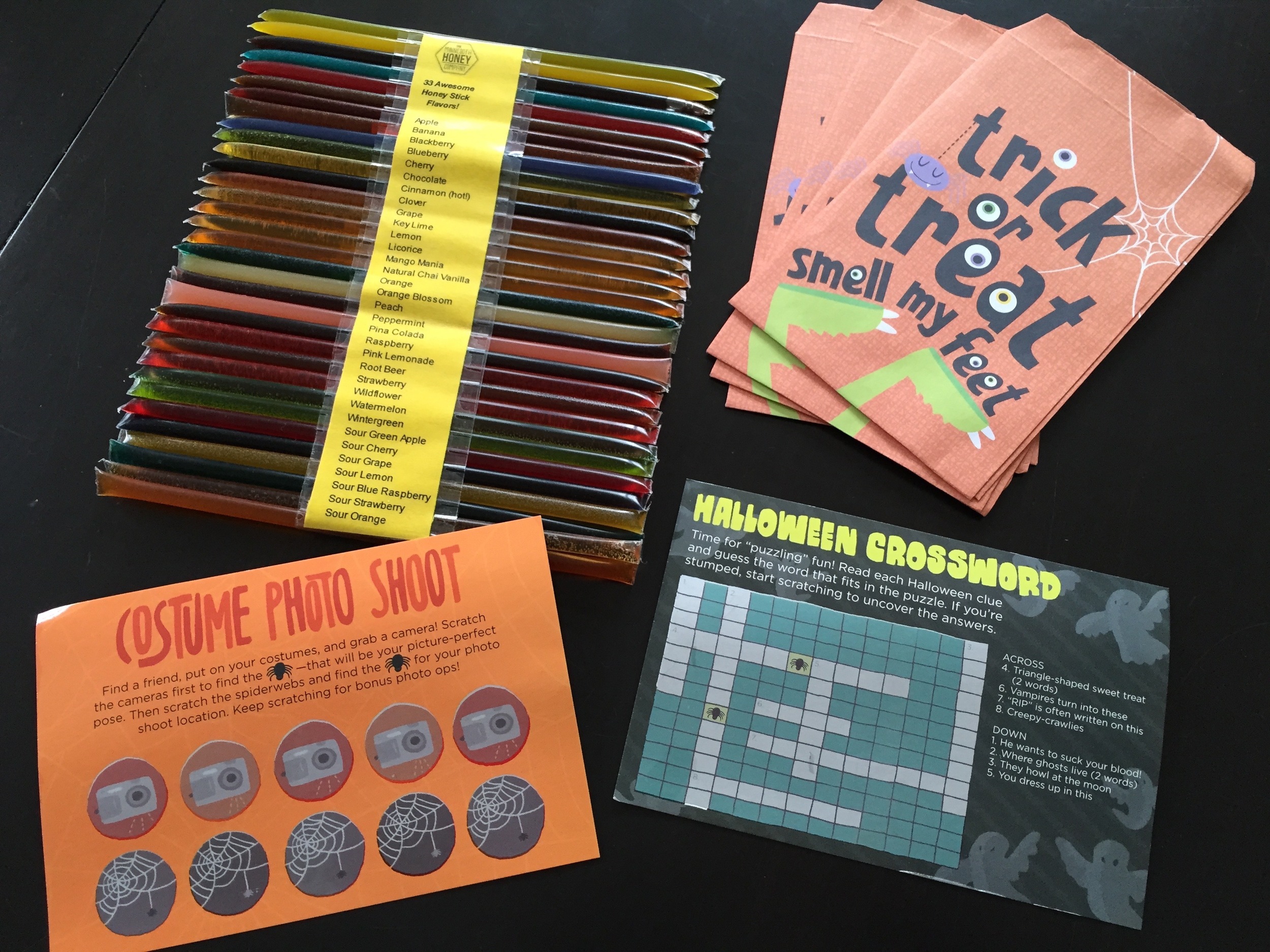 Last year our classmate pinches were two Halloween themed scratch off cards (Kiddywampus) and a couple of honey sticks in each treat bag. Look at all the flavors of honey!