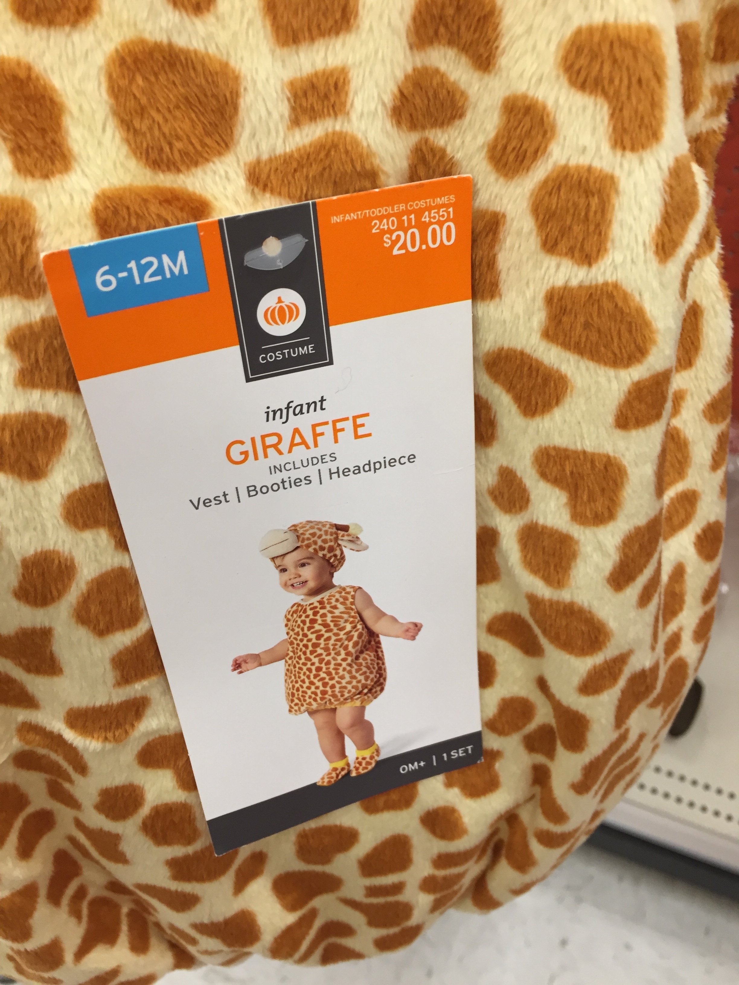 This adorable costume was a steal at $10. But shhh, I picked up some secret goodies that I didn't tell my brother or sister-in-law about. My niece will be "a neck above" the fashionistas next year!