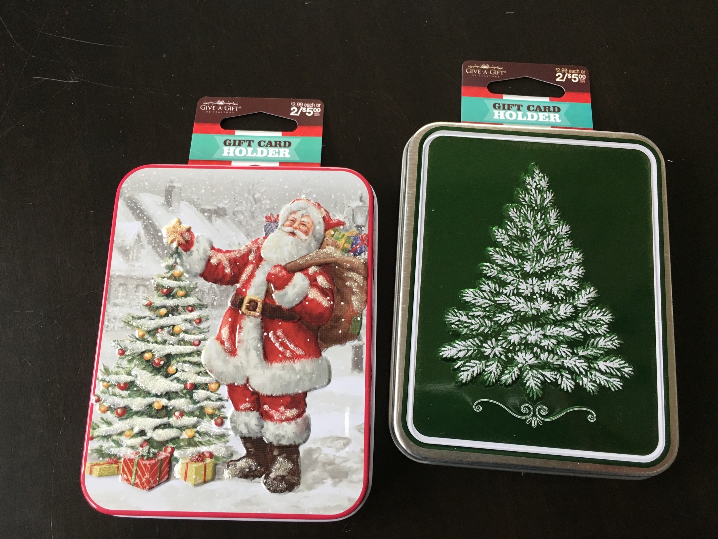 These tins measure 3.5 x 4.5 inches and are a half inch thick. Inside is a black fake velvet insert with a little area to nestle the gift card. After, the insert could be taken out and the tin could be used for other treasures. Do the math - half of $5.00 is $2.50 for two tins!! Gift card holders should be on your radar when you shop the sales after Xmas this year.