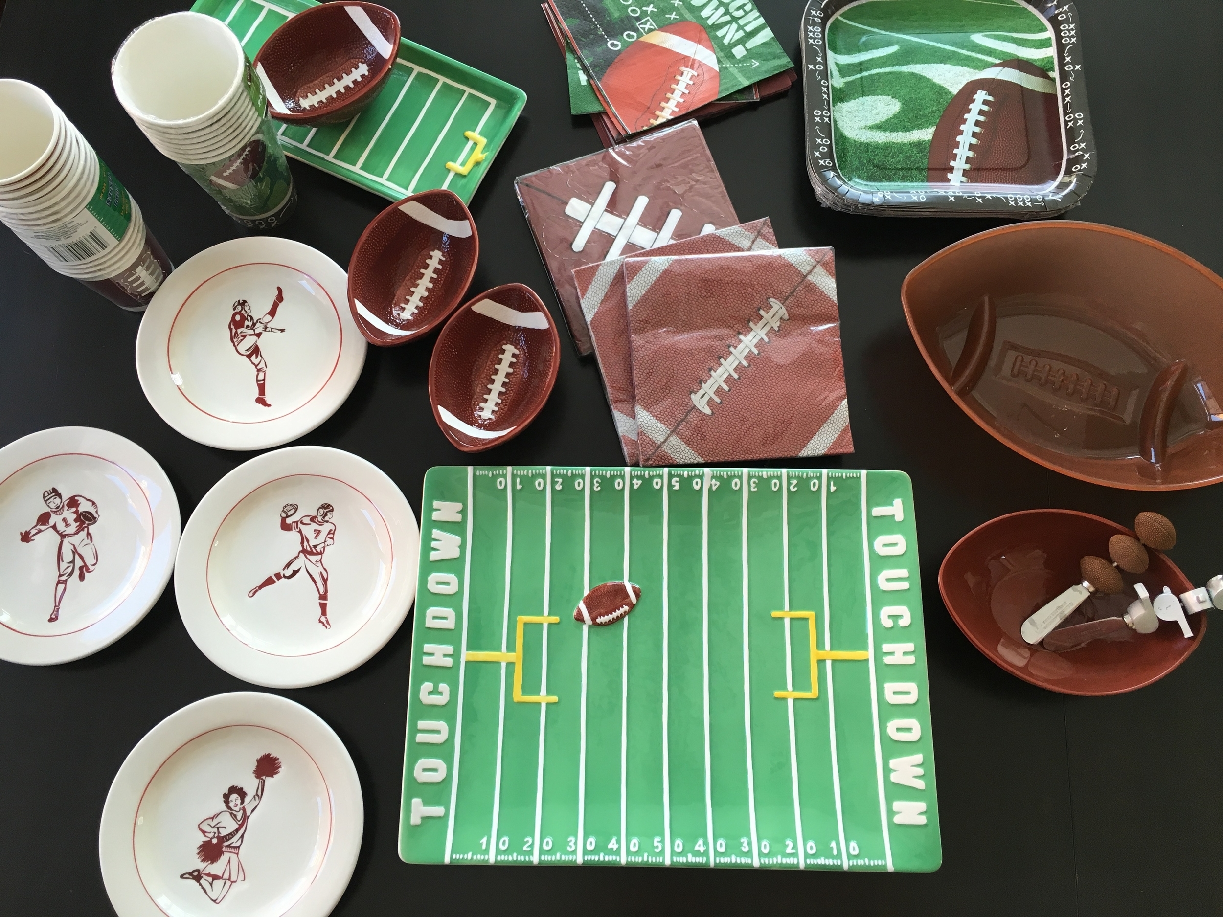 I love using these items to make our Super Bowl celebrations festive. The vintage small eats plates and the whistles &amp; football spreaders (inside the football dish) were thoughtful pinches from my cousin Jay-Jay. I bought the two green football …