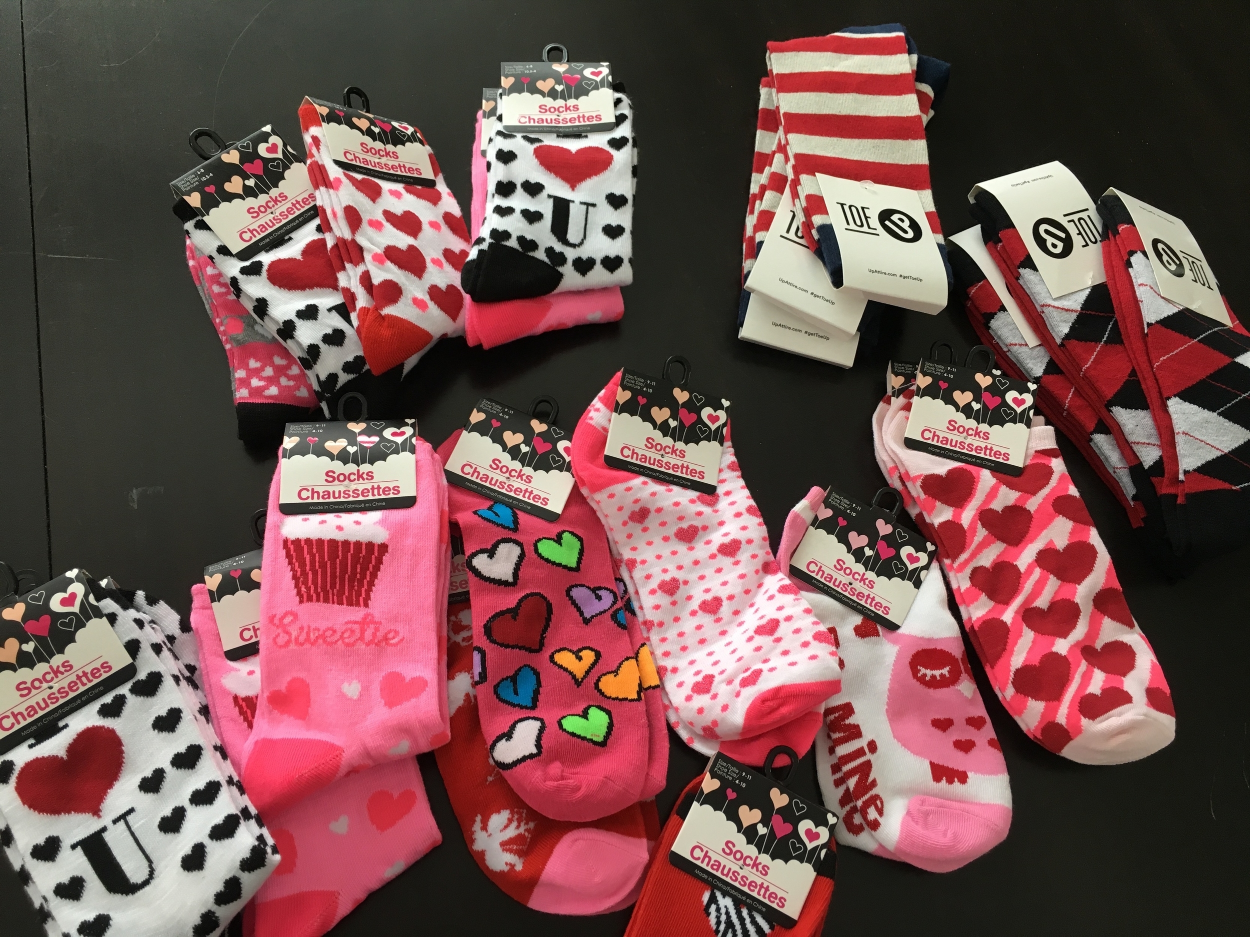 All the feminine socks are from The Dollar Tree and the Toe Up socks are for the male teachers.