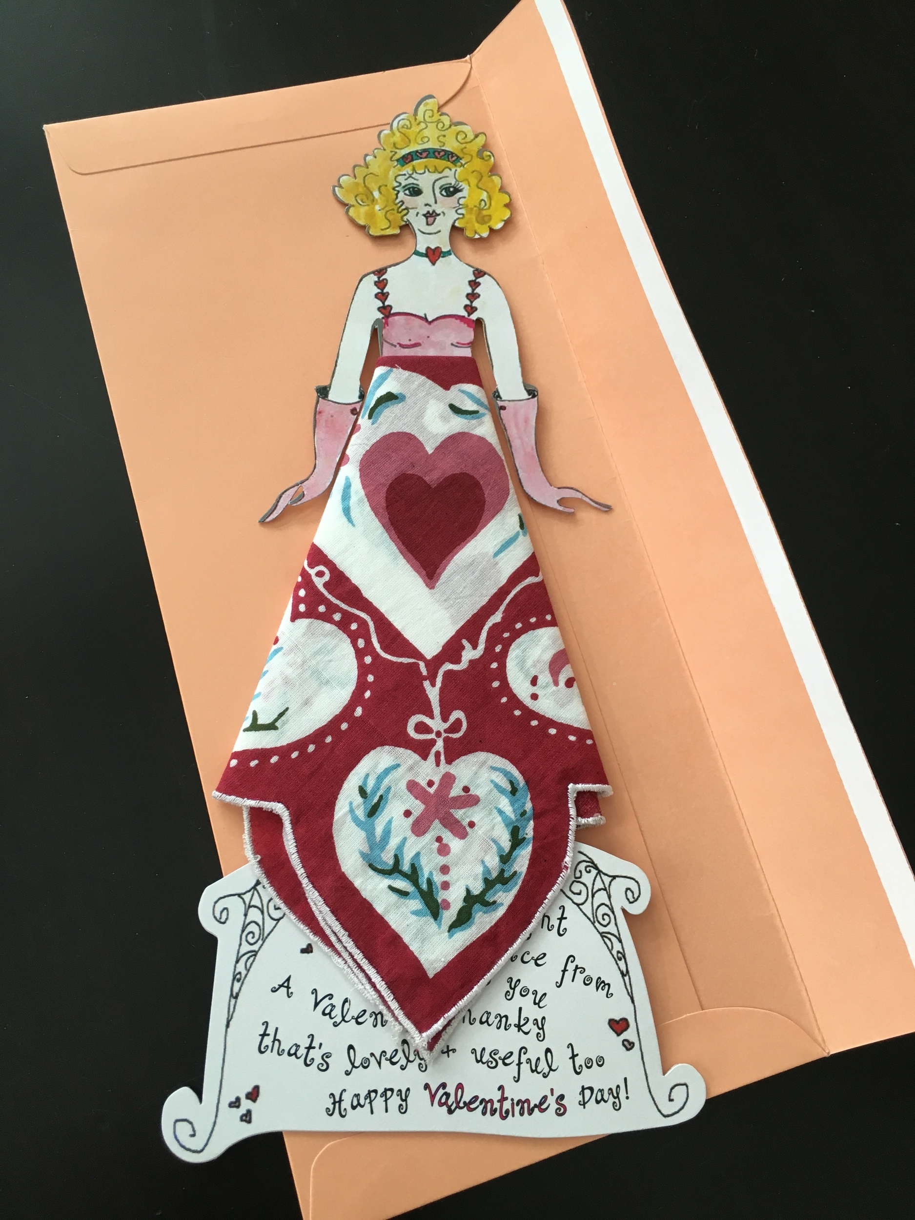 There are several styles. You can write a message under the flap. This one says: A gift. A thought. A remembrance from me to you. A Valentine hanky that's lovely + useful too. Happy Valentine's Day. Sale price last year after Valentine's Day was $6 at Creative Kidstuff.