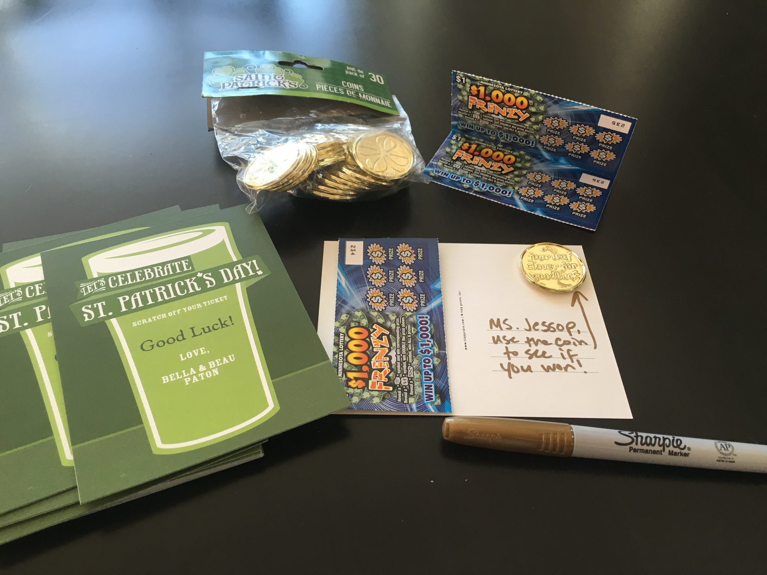 Tiny Prints allowed me to customize all the print under the "Let's Celebrate St. Patrick's Day!" text. Shhh! I think the kids think its a glass of green milk. I picked up a bag of 30 gold coins that say "Four leaf clover for good luck" on one side a…