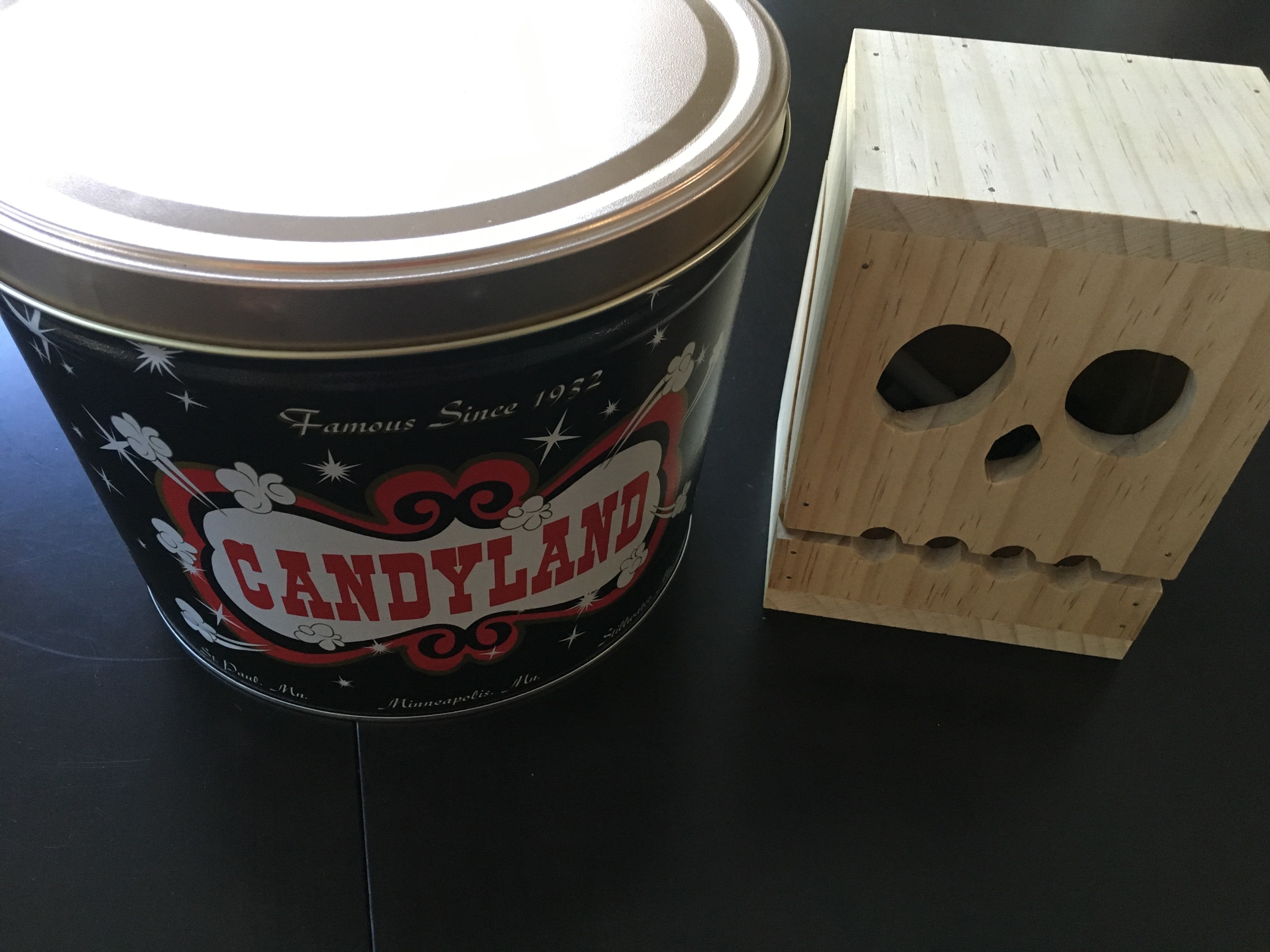 They gave me a tub of the "Chicago Mix" popcorn for Mother's Day. Derek made Beau a monster box that opens up via the mouth and stores some of his treasures - one of which is a bracelet Derek made.