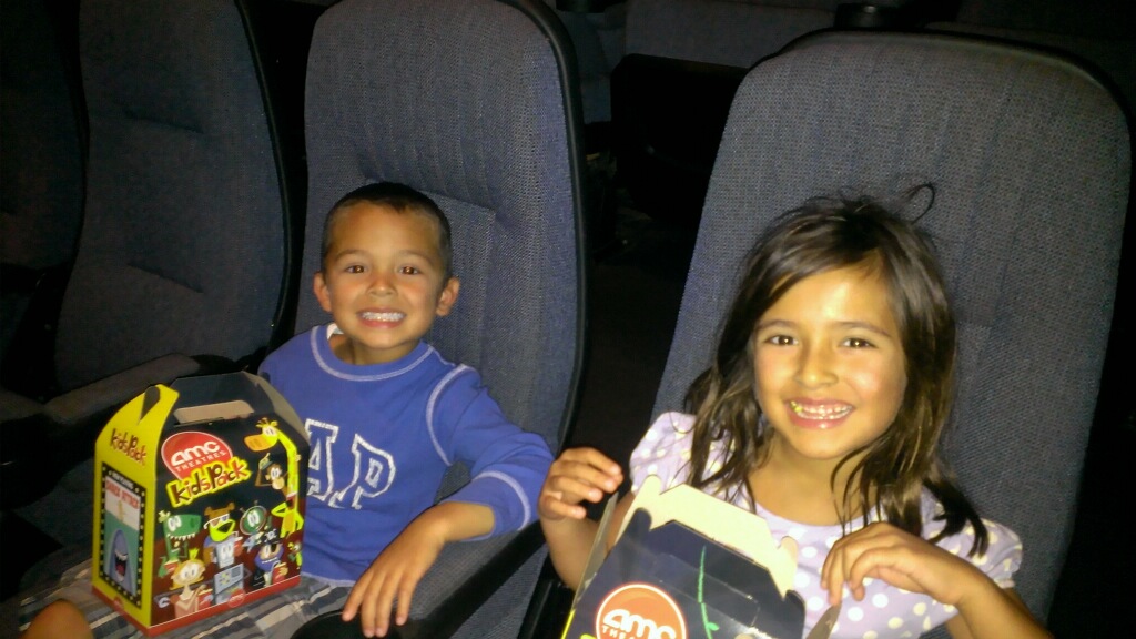 Instagram Message: Happy Popcorn Day? These guys were with dad so I'm sure there was no butter on the popcorn or raisinettes mixed in. 