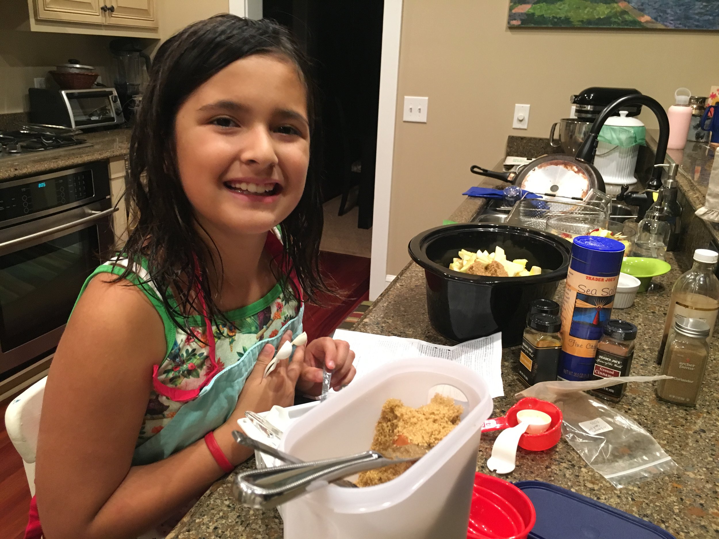 She helped me make the apple butter and my son will help scoop into jars and give out the pinches .