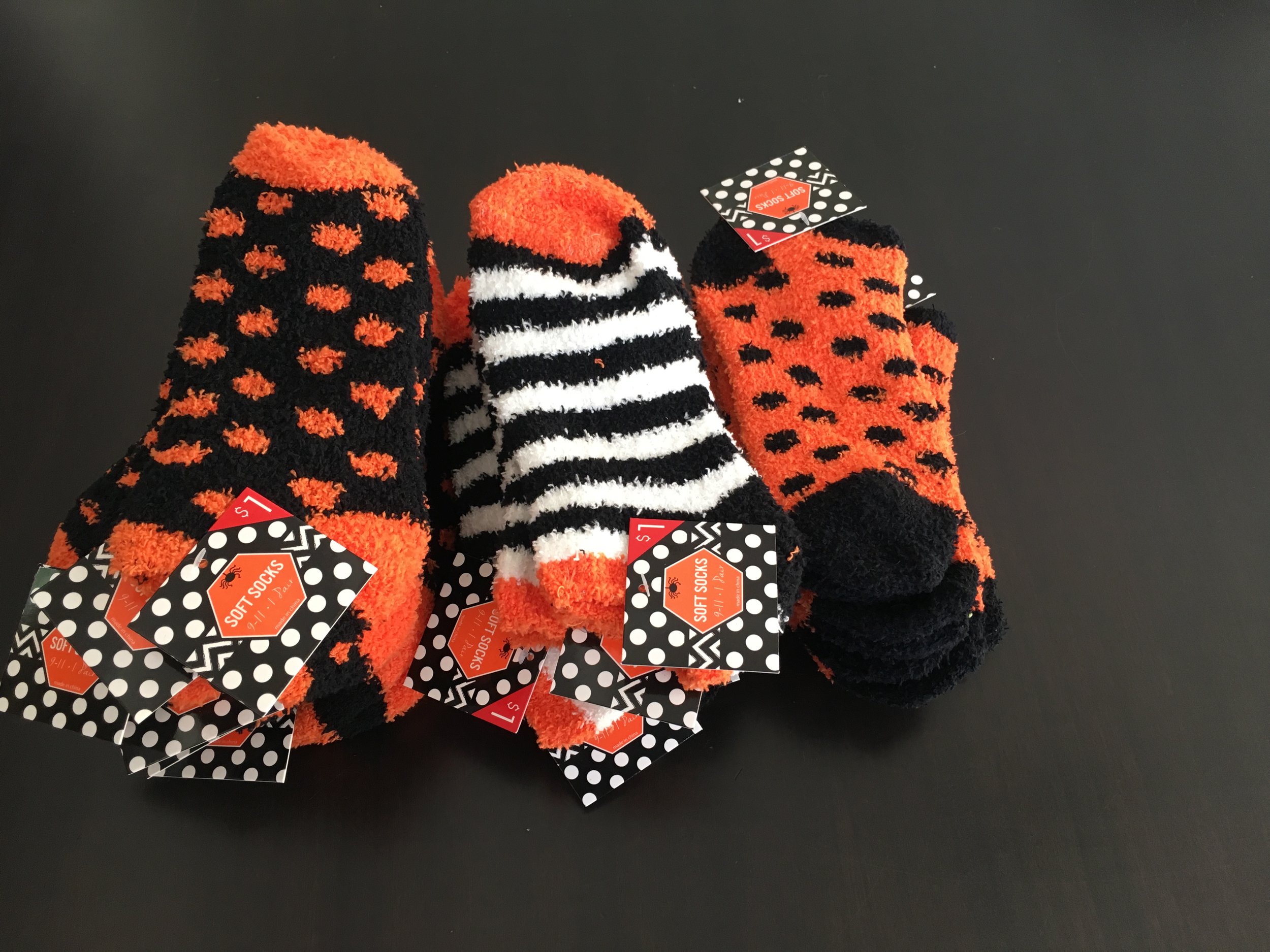 Trick or treat, smell my feet. I found these socks at Target last year after Halloween and they were half off. Yes, folks, each pair was 50 cents. Even though I'm not in love with how they look - they feel so soft and fluffy.