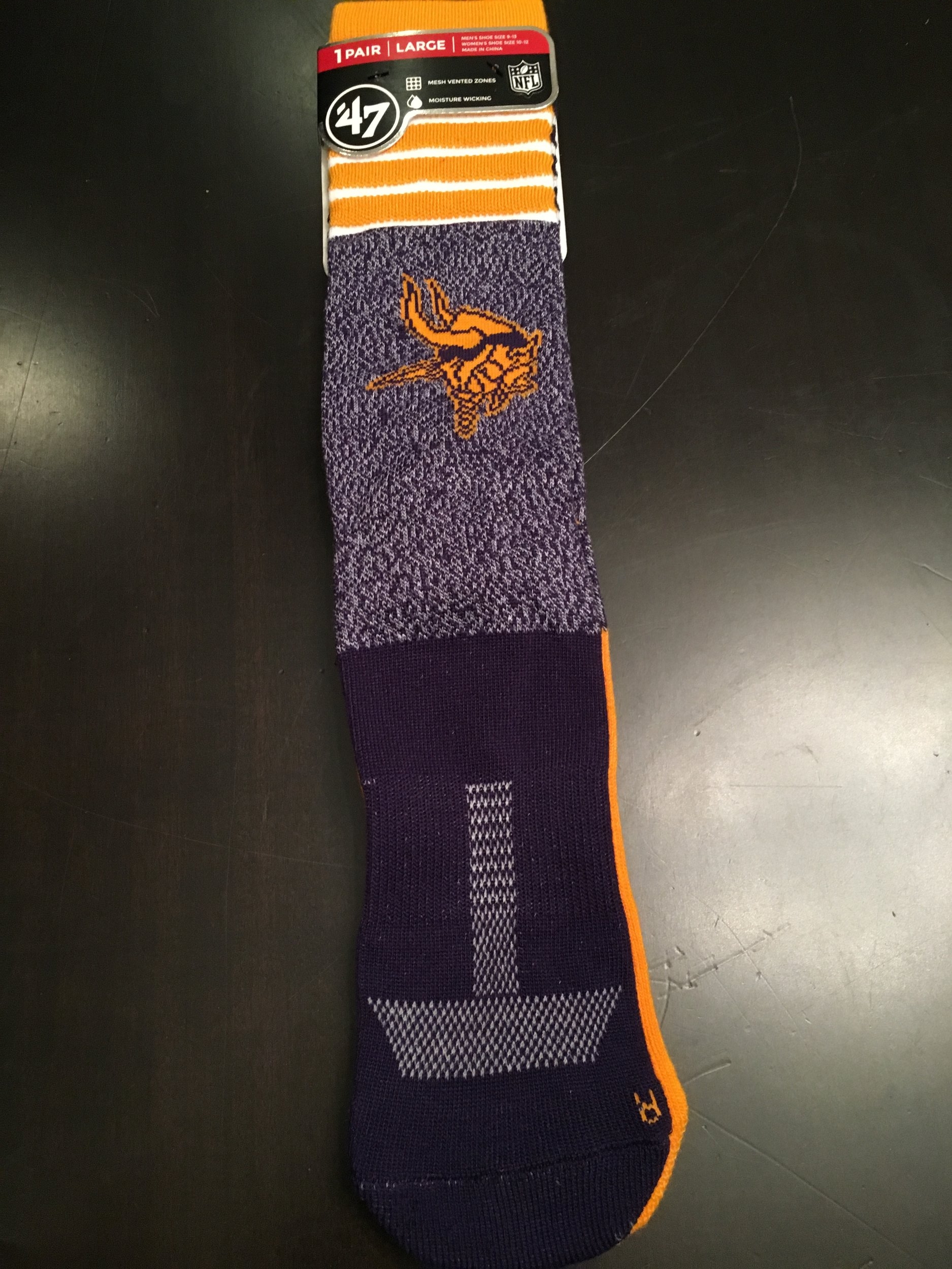 My son will dress up as a football player. Original. So going along with the smell-my-feet-sock theme and tying it into football, these socks are his pinch from me.