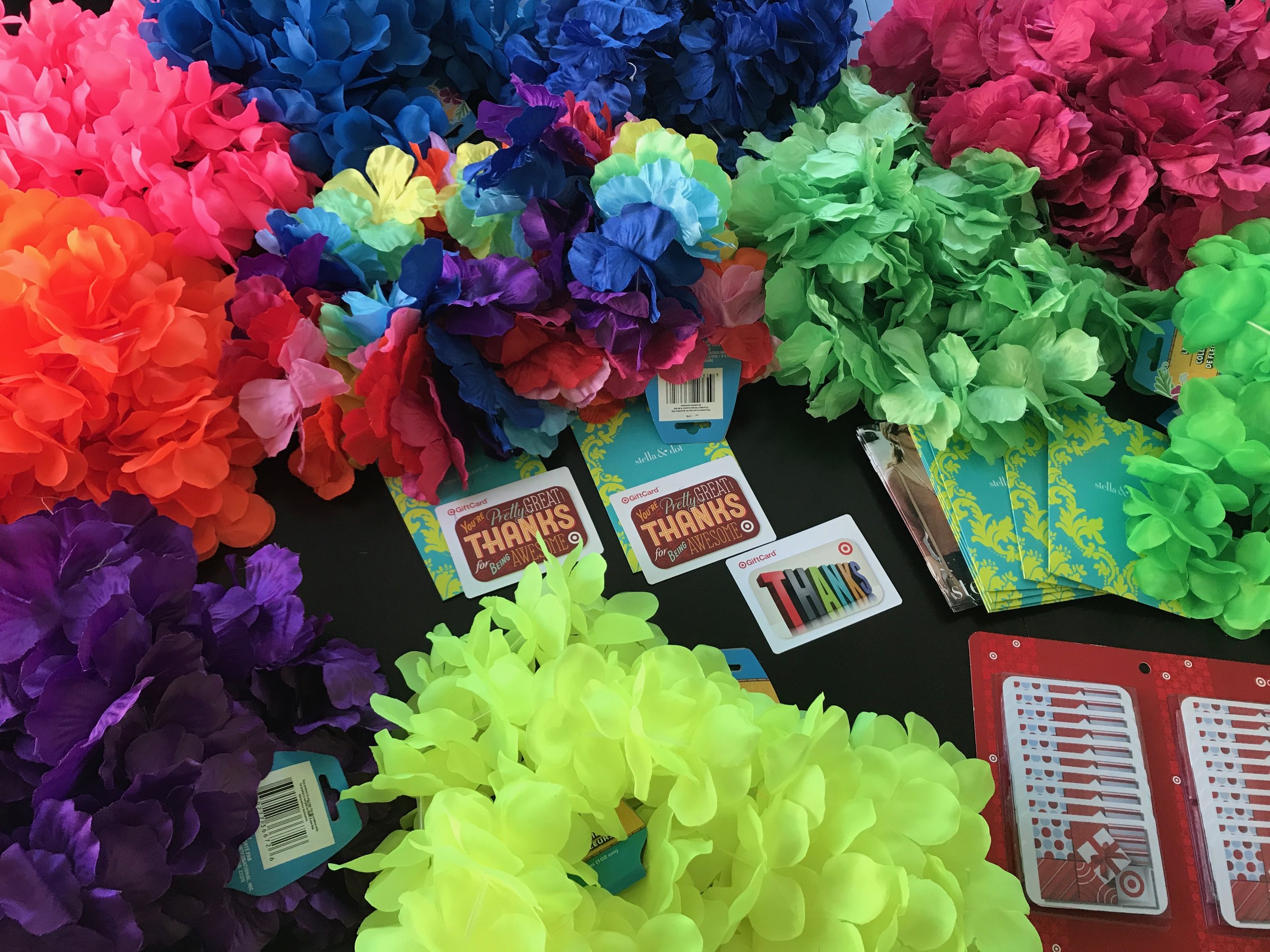 Went to Dollar Tree and bought 24 leis. Already have the Stella & Dot , Amazon and Target gift cards. Just need Barnes & Noble and Starbucks gift cards. The main teachers get the rainbow leis. 