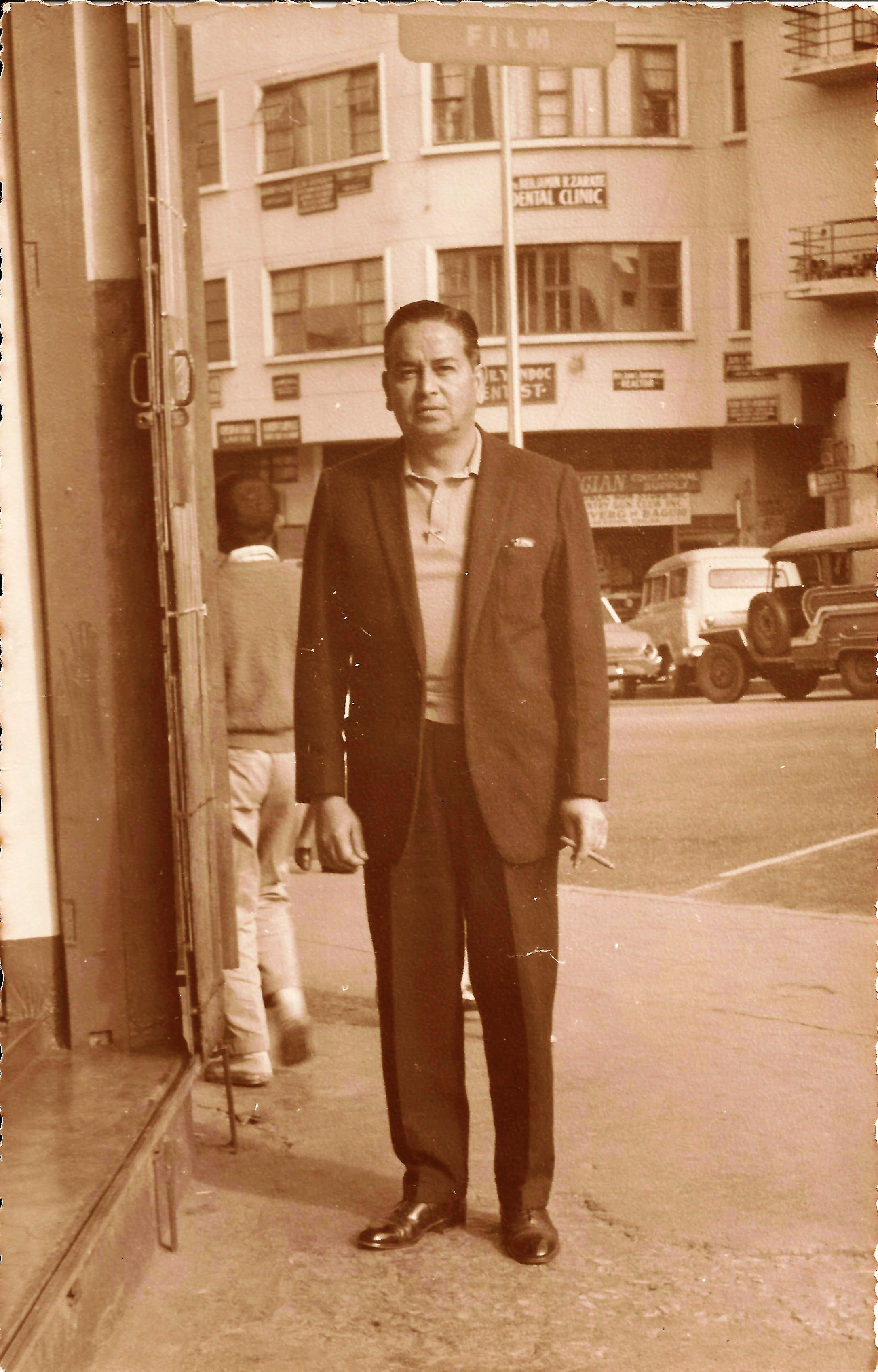 Grandpa with his shiny shoes, cigar, probably cashmere sweater and what's that in his top pocket? A hanky. Stylish. He insisted in very good quality over quantity always. Not shown: his gold pocket watch.