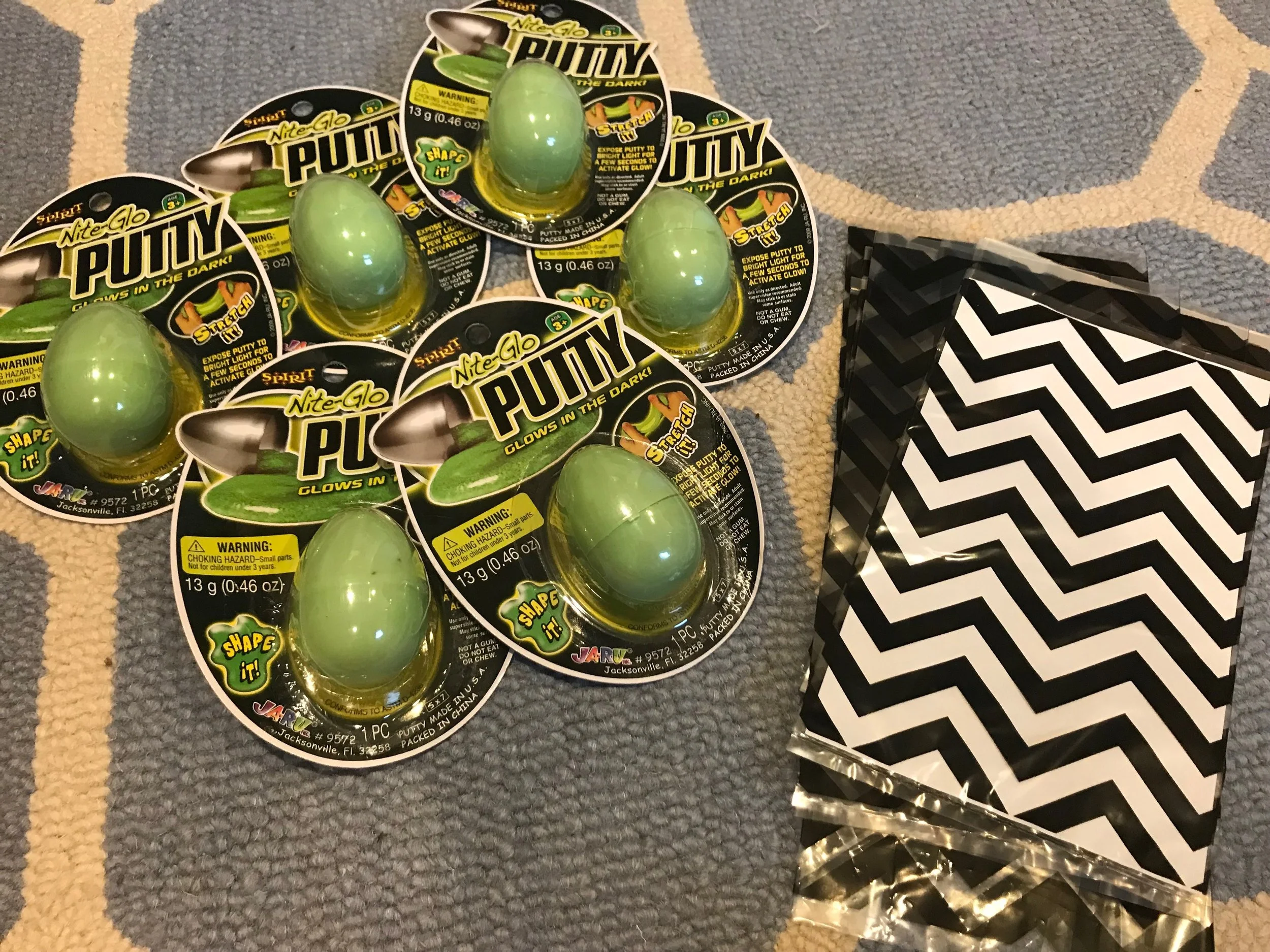 My daughter's ballet carpool buddies are all getting a treat bag too. Putty, candy corn and fortune cookies.