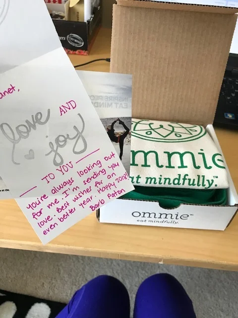 I was sending a grocery bag and five bars to my friend Janet because she is always looking out for my health. The owner of Ommie, Claudia, hand-wrote my sentiments for me on a card before sending the thoughtful pinch.