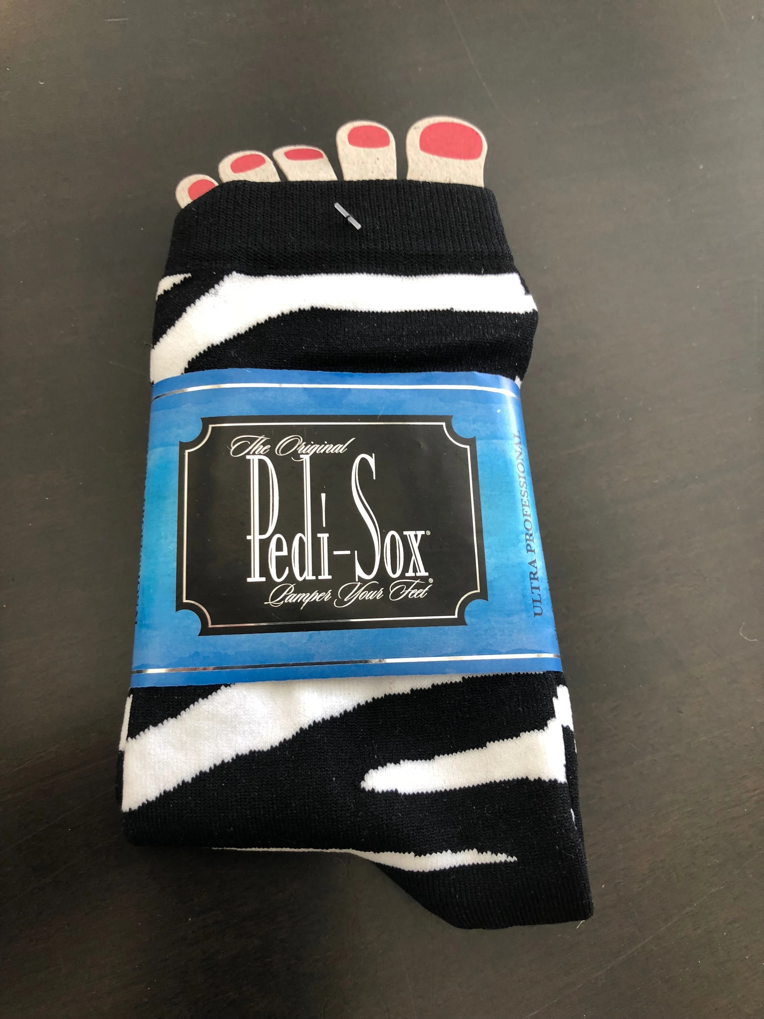 Maybe those of you in warmer states wouldn't appreciate these but where I live, these socks come in handy. They keep the rest of your feet warm while the toes nails dry. 