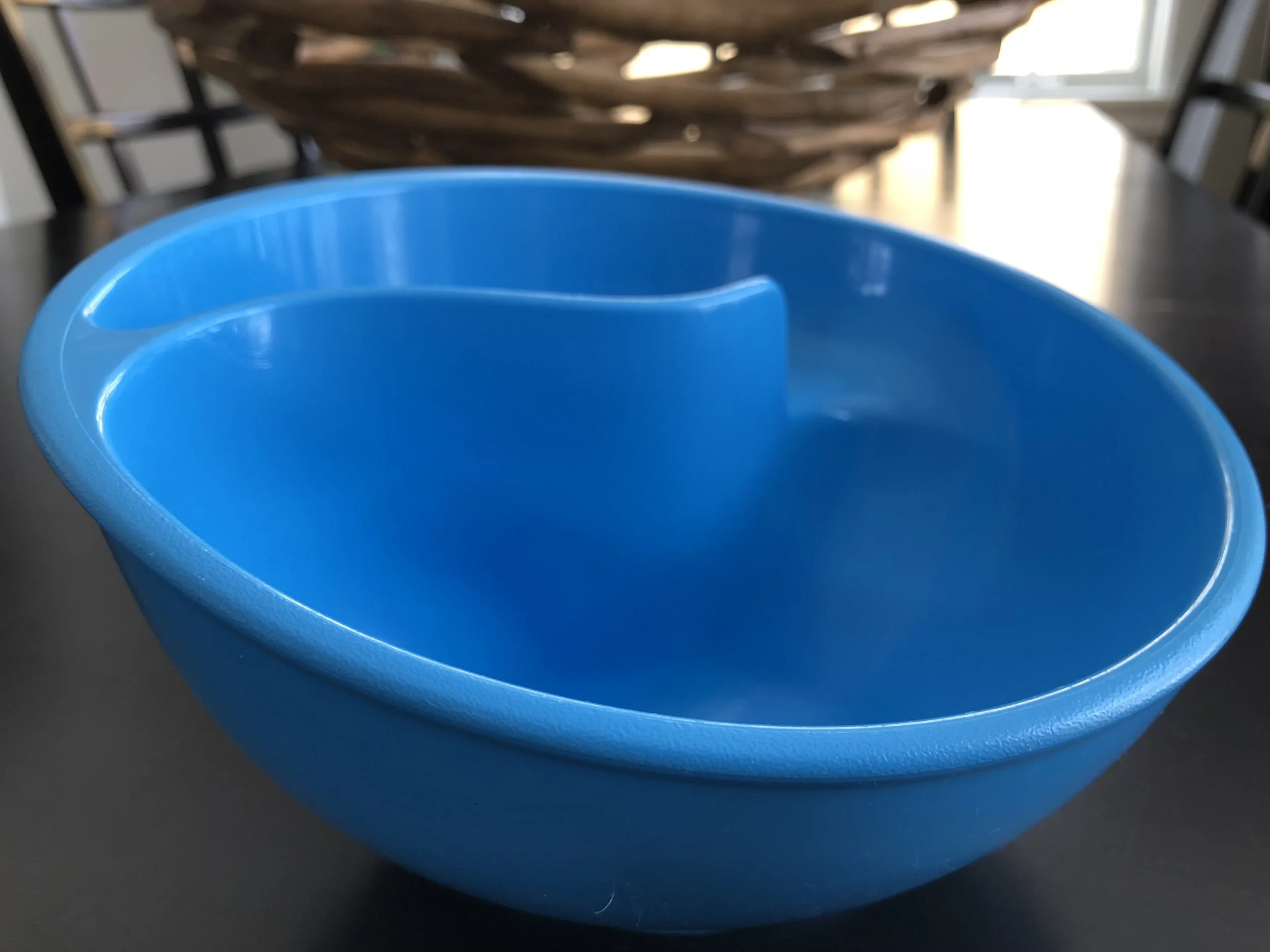 Here's a glimpse of my son's food pickiness or control issues. My son's cereal bowl keeps the cereal dry and not mushy because he controls when the cereal goes into the milk. I bought it years ago at Brookstone's - I think.