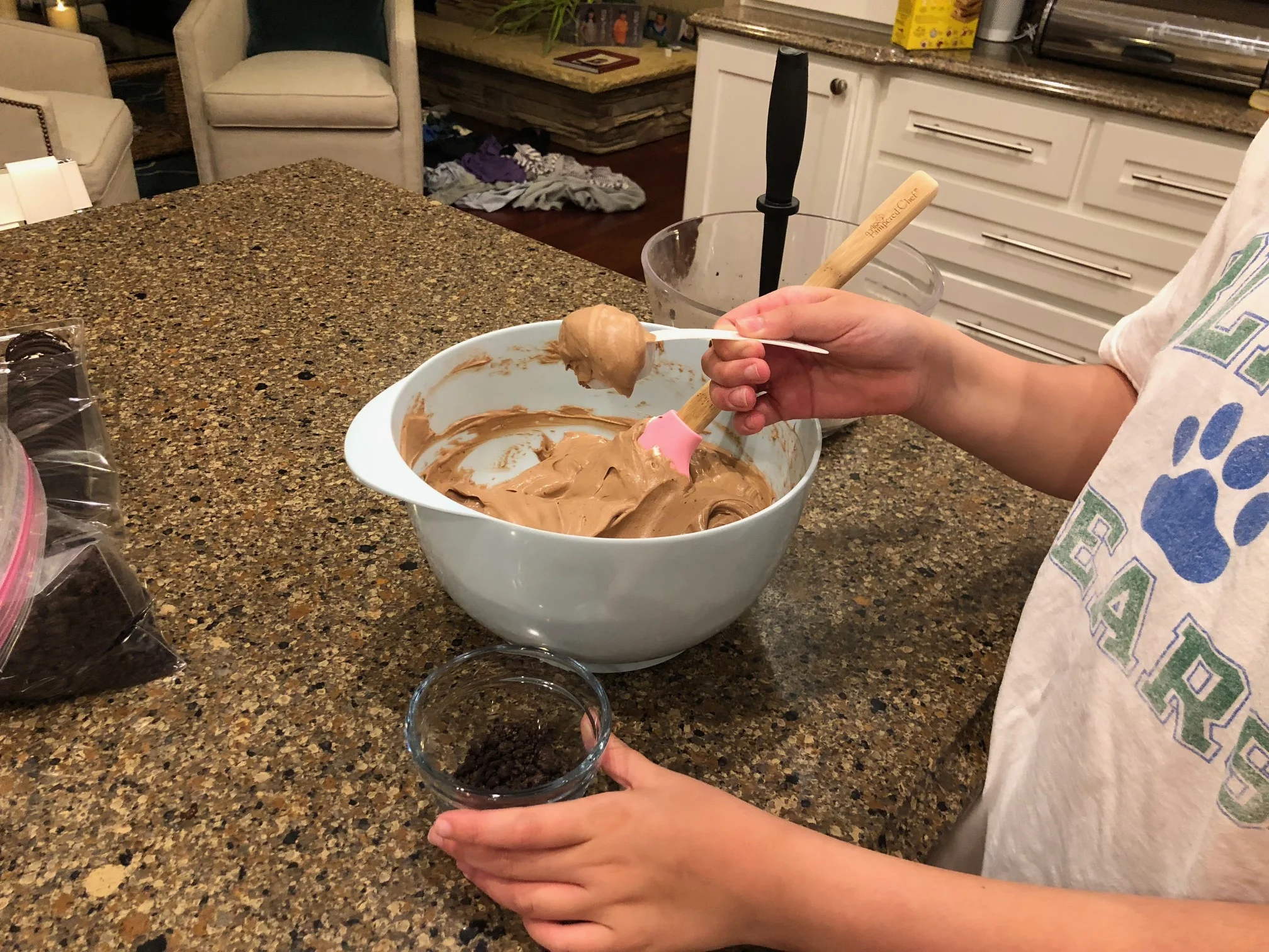Then she folded the homemade whipped cream into the pudding to make a lighter colored mud.