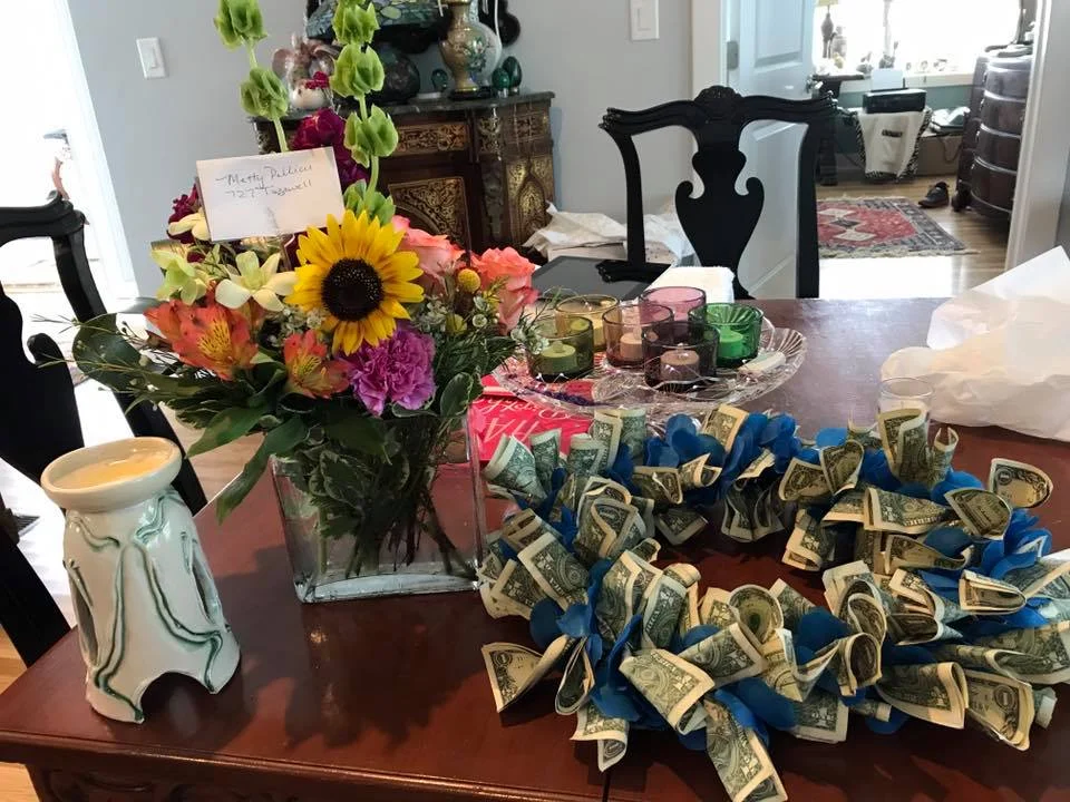 Many single dollar bills for my aunt/Godmother's 75th birthday.