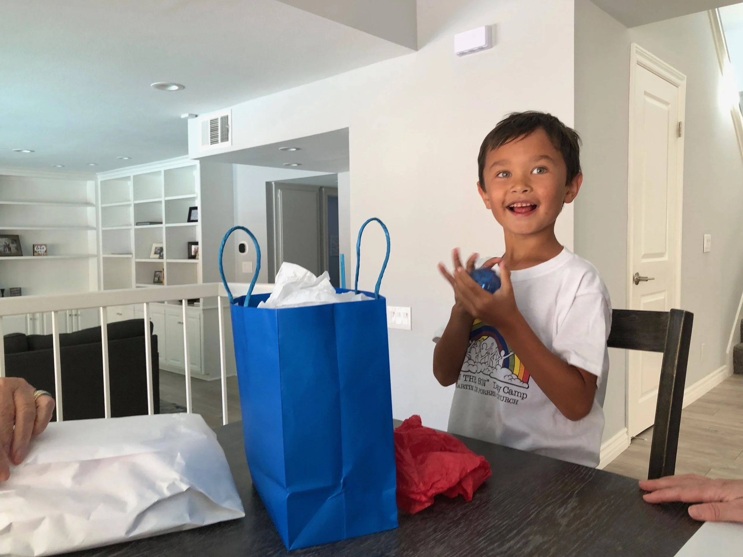 My nephew Colton opening up his Target trinkets.