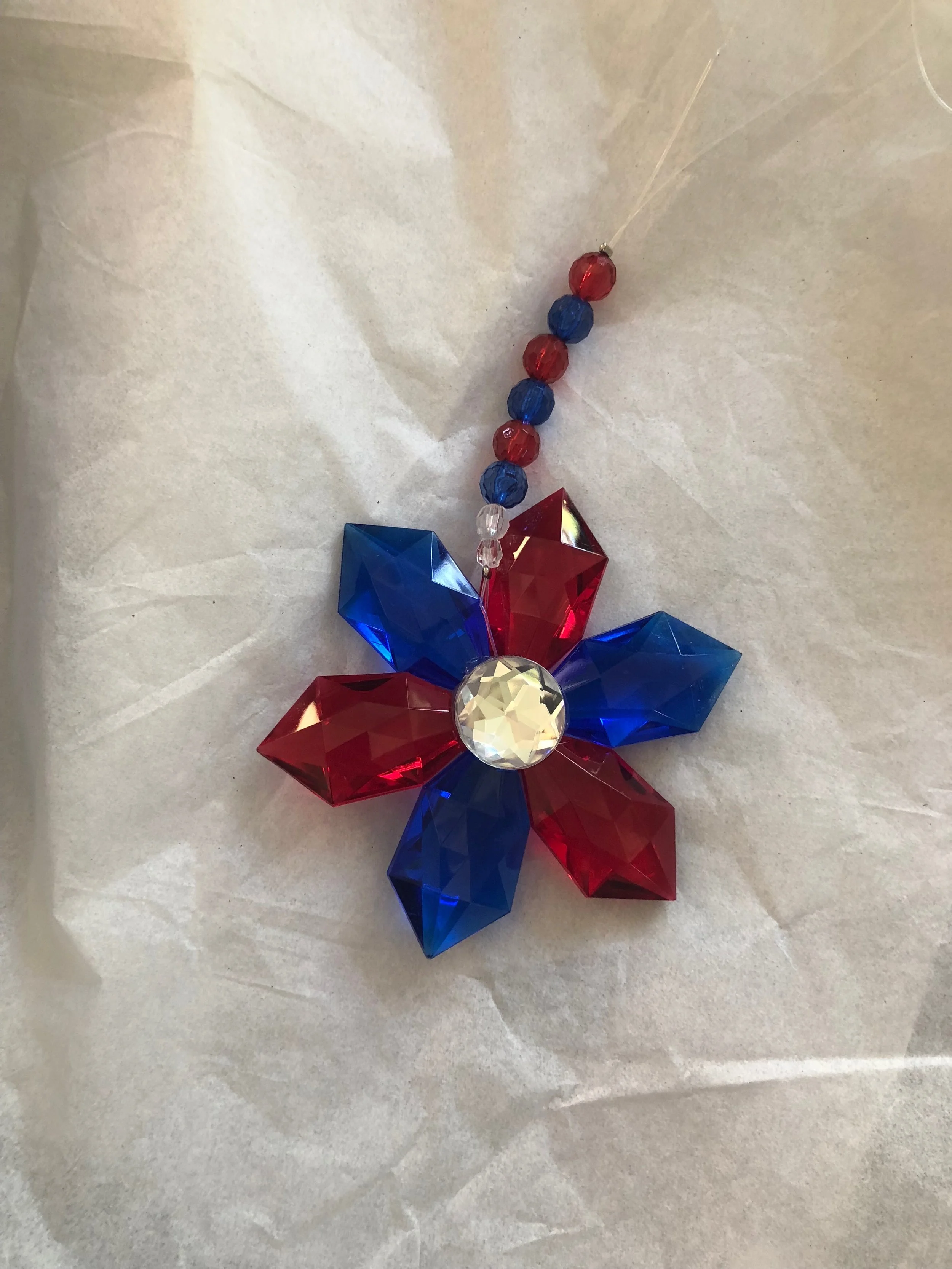 For our piano teacher, we wanted to give something sparkly but in a different way. She likes crystals so when I saw this, I had to get it for her. Maybe every Fourth of July she will put it in a window and think of us.