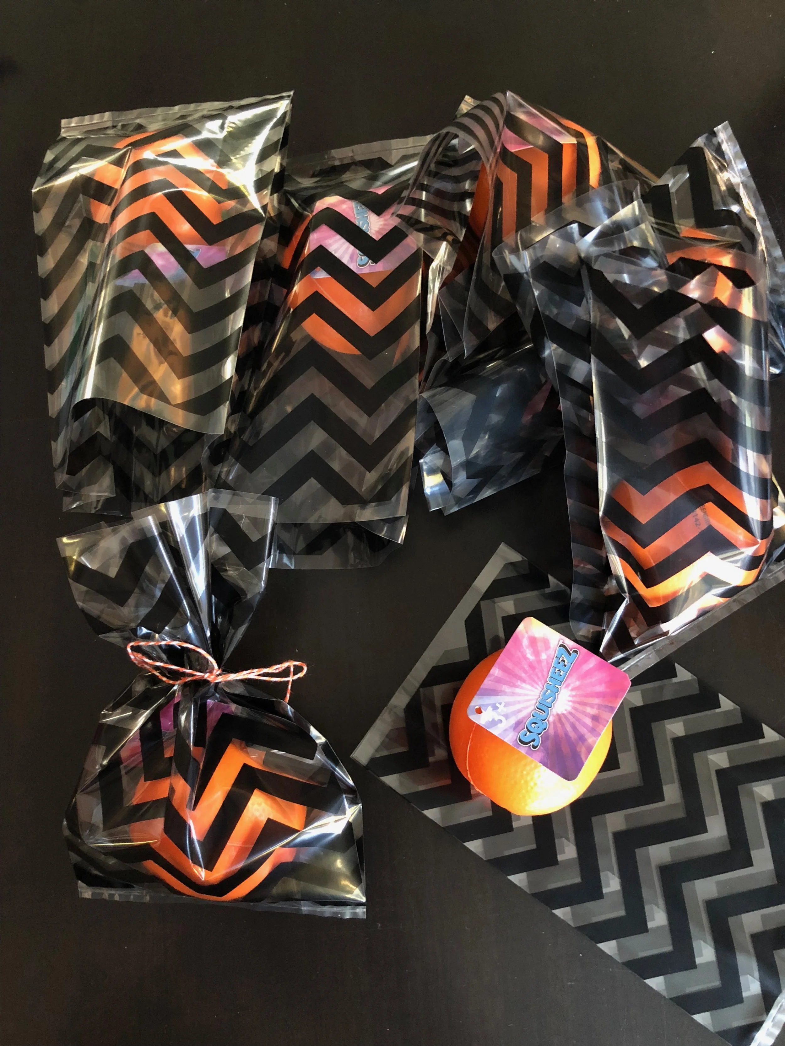 My daughter insisted on giving her nine classmates in her Advisory group a pinch so I found these “squisheez”at Dollar Tree. They are oranges, not pumpkins but the color works here.