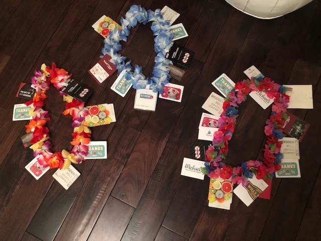 Families picked up gift cards in all sorts of denominations to give to the hockey coaches and I attached them to the leis. The coaches got to go on a shopping “vacay”.