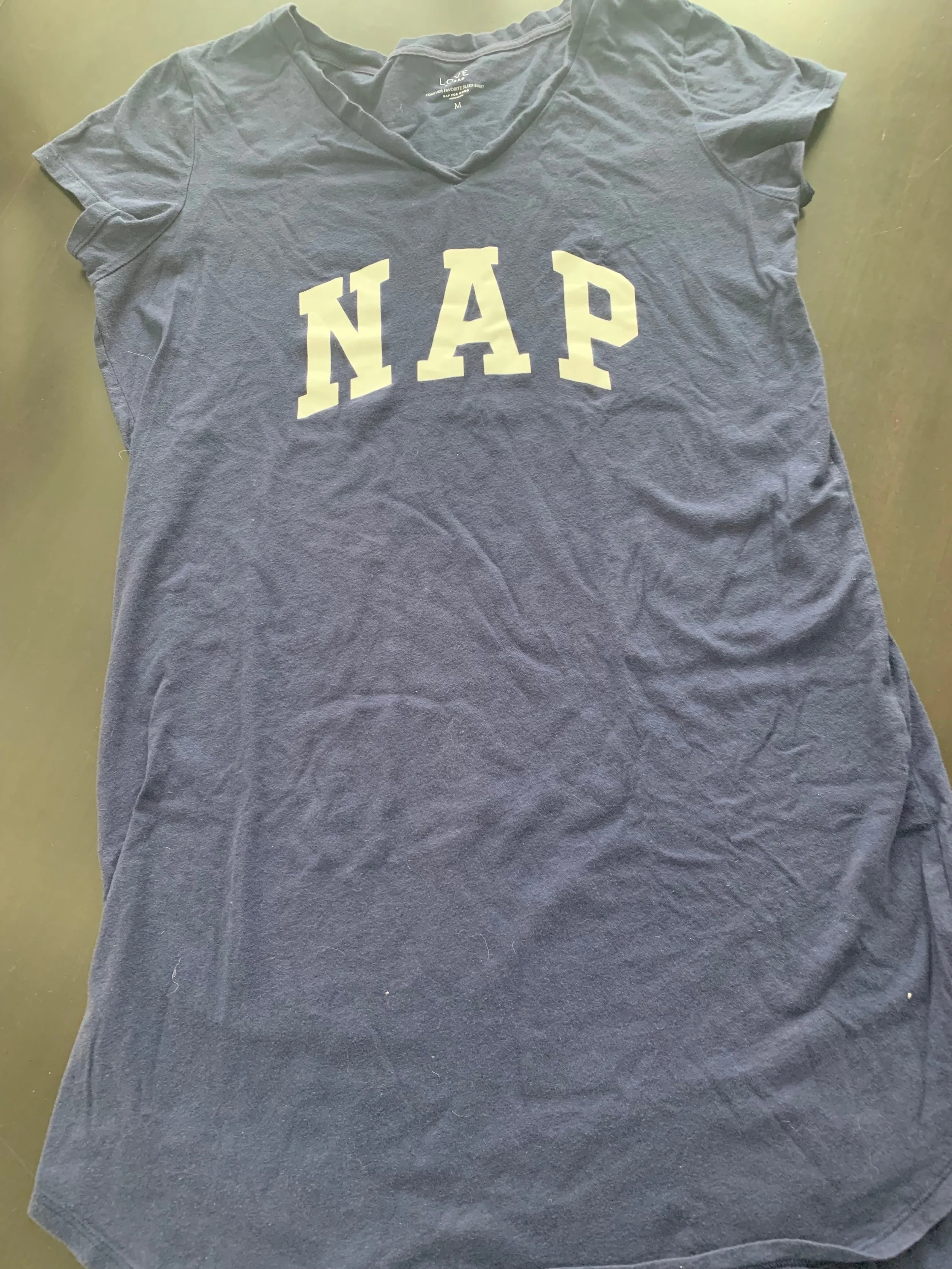 My daughter spotted this night shirt when we were shopping at the Gap Factory and she said I had to get it. She was right. It was a thoughtful pinch to myself and it’s one of my favorite things to wear. The material is super soft and I sized up for baggy freedom.