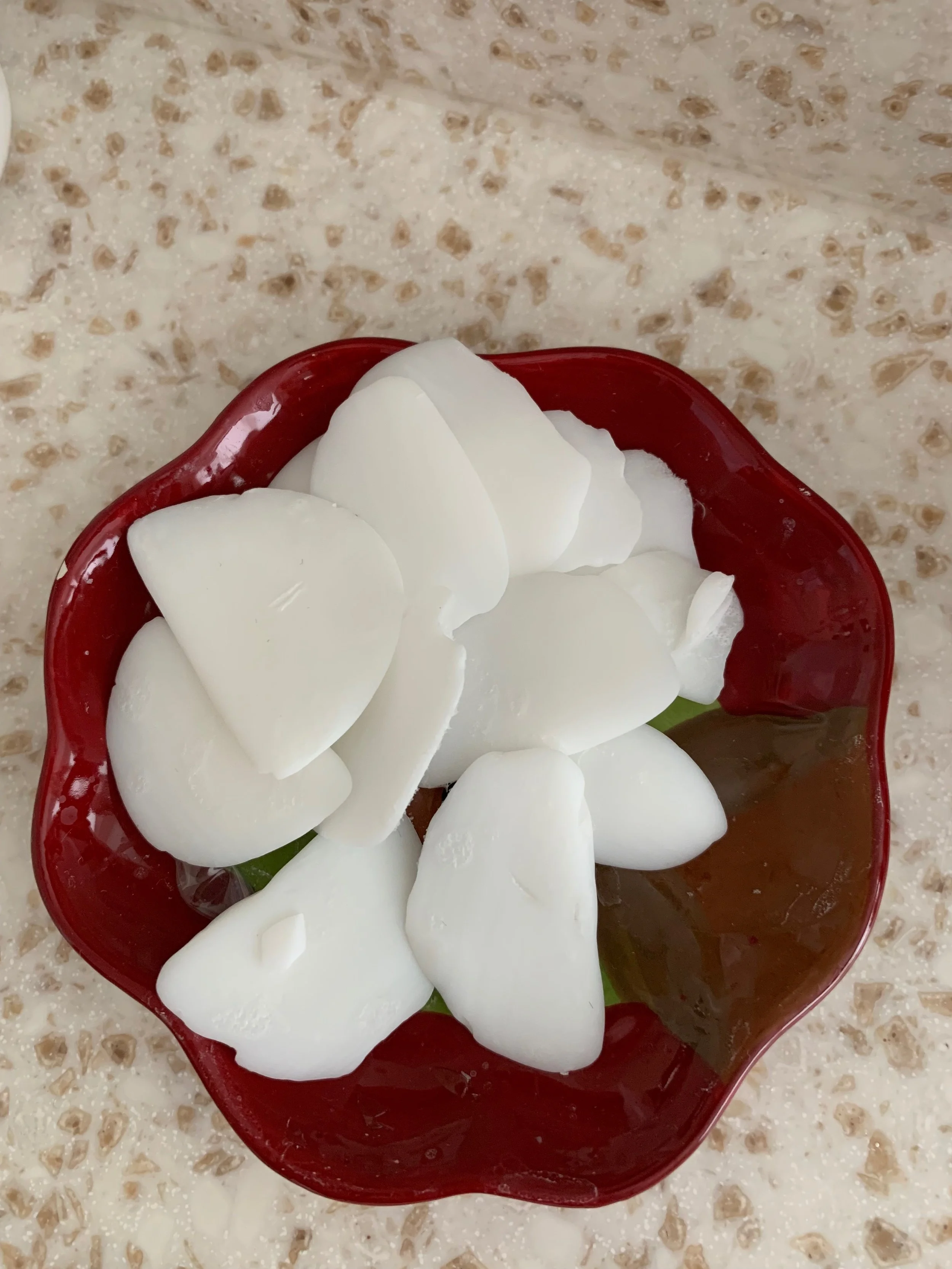 It’s a small dish of soap PIECES that I keep next to my bathroom sink.