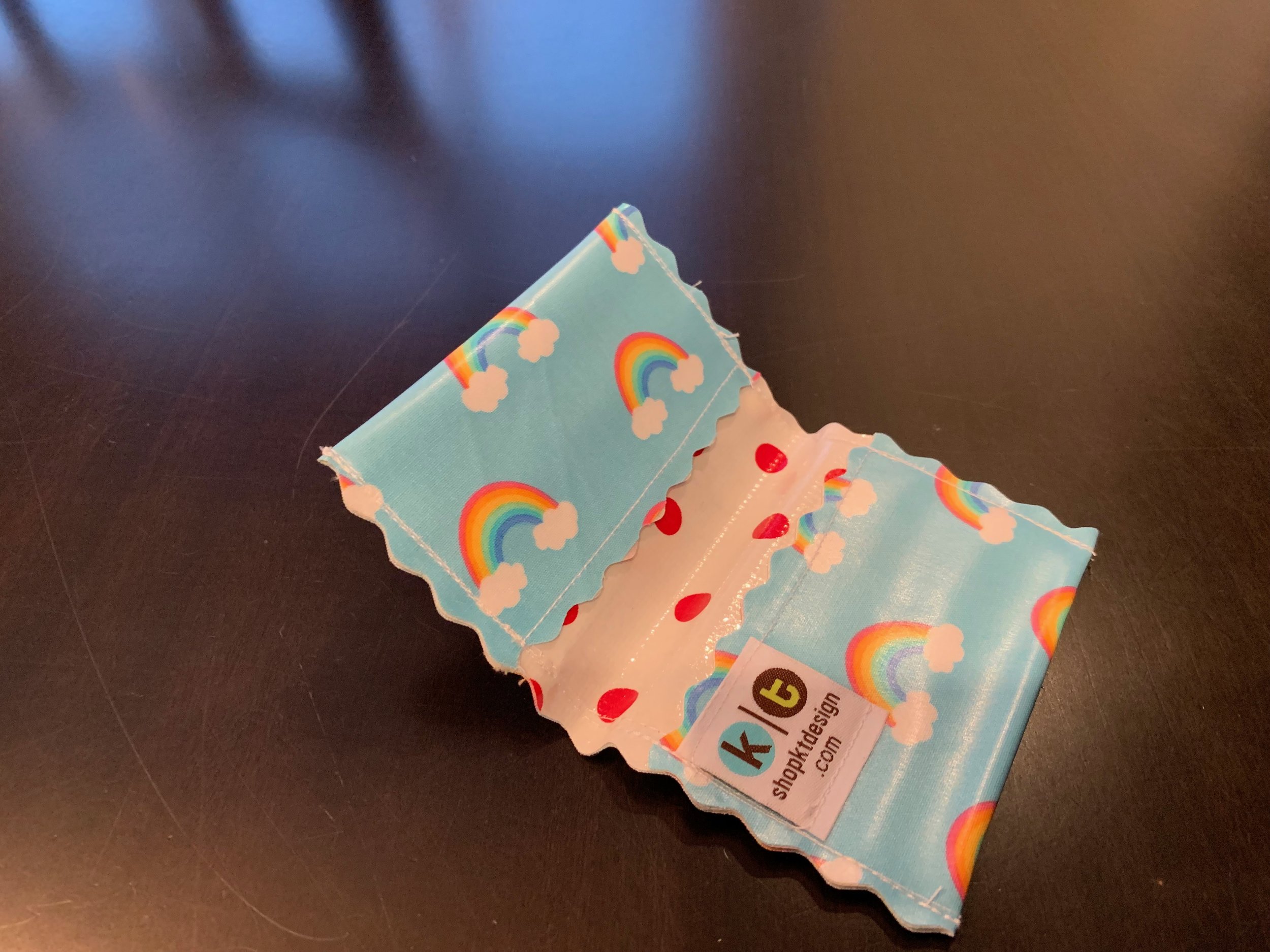 KT Design makes these wallets. You can use them for gifts cards or when you want to just carry your driver’s license, a $20 bill and/or a single credit card while you’re out for a GNO or date night.