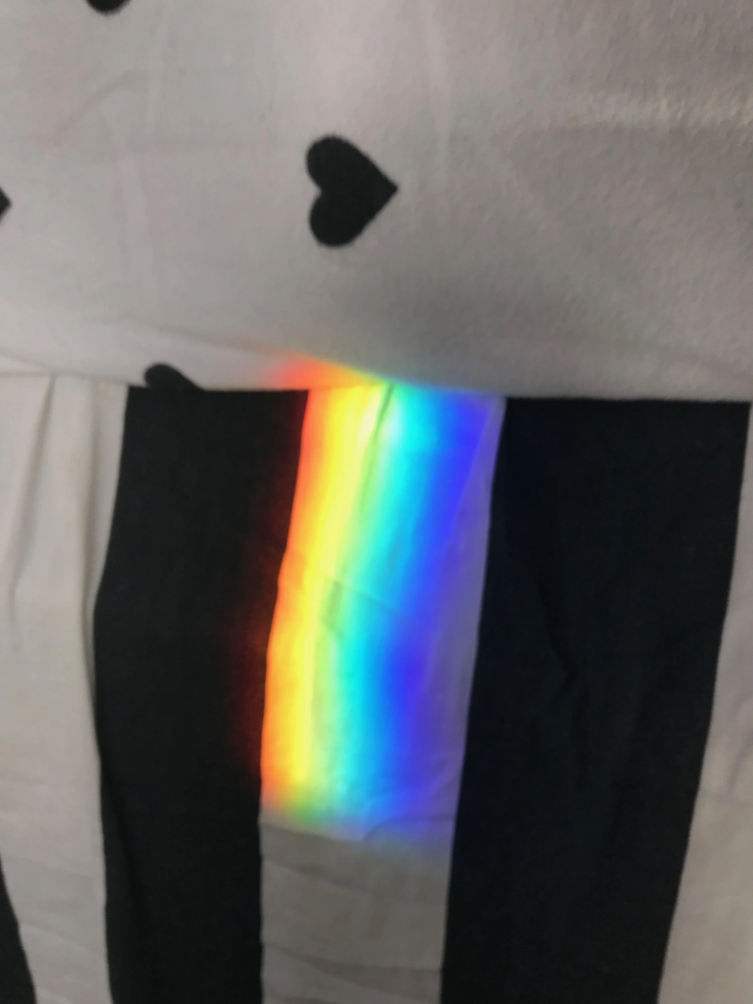 Just this morning, my daughter took a picture of this rainbow. She found it on the bedding in her room. I love how the vivid colors brighten the day.