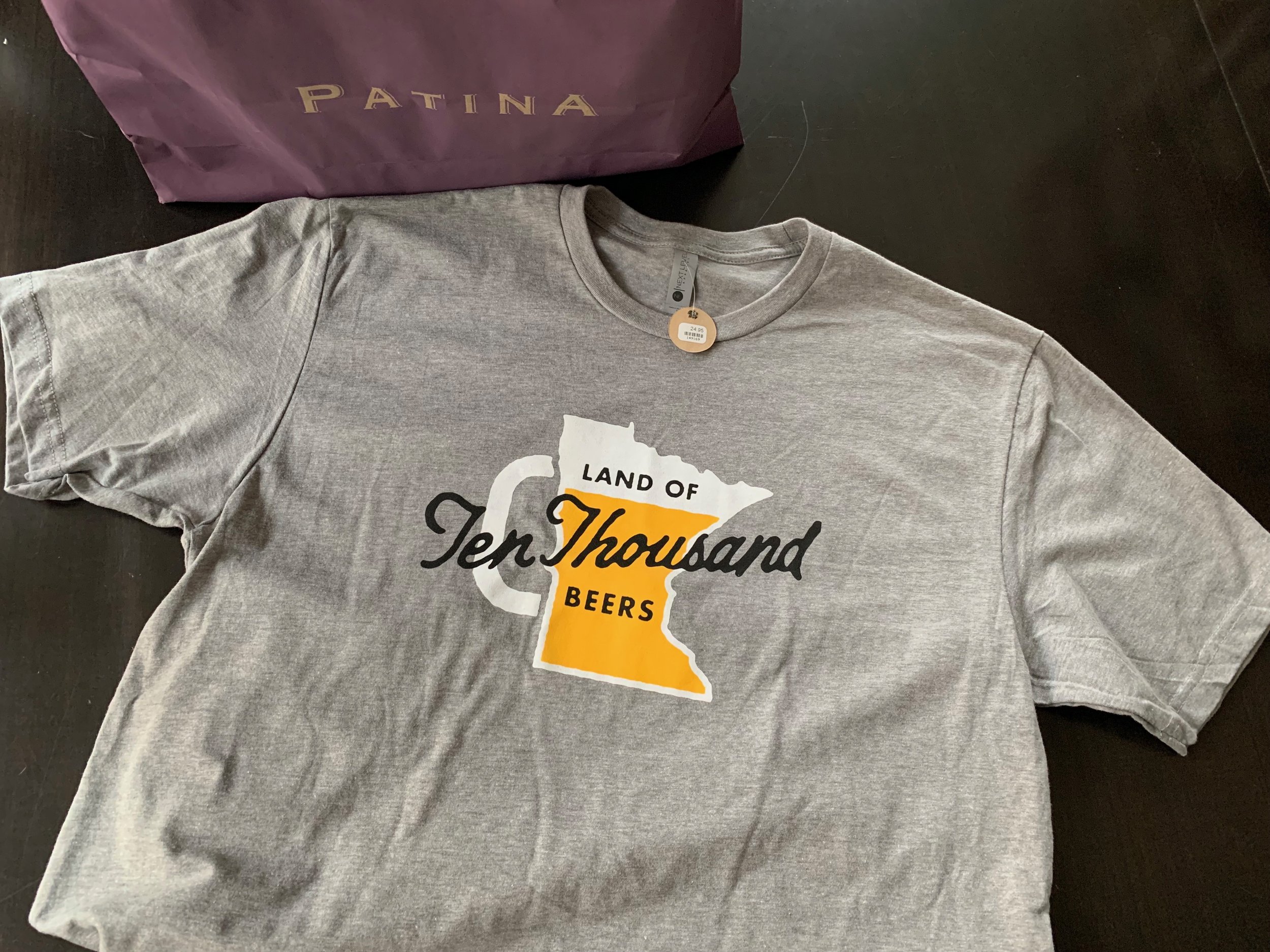 A word play on the Minnesota state slogan - Land of 10,000 Lakes -makes a perfect beer shirt. Someone who wears this shirt is just an all around beer lover whether they live in MN or not and regardless of the light taste/great filling dilemma. Patina : $24.95