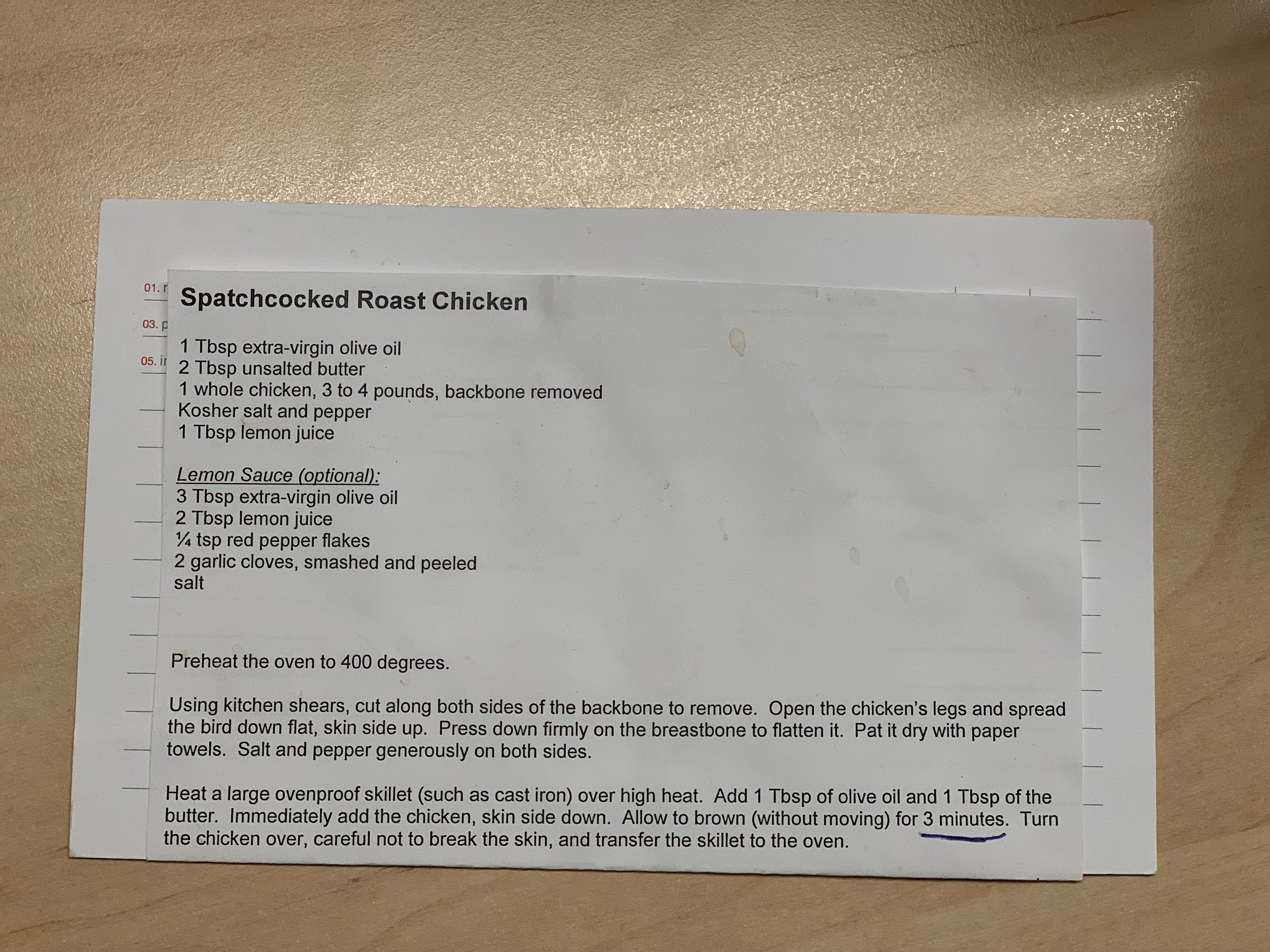 The chicken is done when it is golden brown and cooked through, about 40-45 minutes. An instant thermometer inserted in the thickest part, not touching the bone, should read 165 degrees. Remove the chicken to a cutting board to rest for 10 minutes. Add 1 Tablespoon of lemon juice and the remaining 1 Tablespoon of butter to the pan drippings and swirl round. Meanwhile, if you want to make the lemon sauce, whisk together 3 Tablespoons of olive oil, 2 Tablespoons of lemon juice, red pepper flakes, garlic and a pinch of salt. Cut the chicken into pieces, drizzle with the pan sauce and/or the optional fresh lemon sauce and serve immediately. - Recipe by Dinner Doulas.