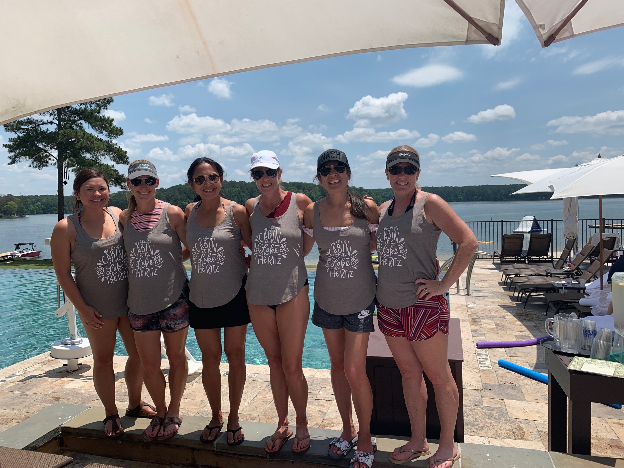 These shirts say, “My idea of a cabin by the lake is the Ritz. Jay’s 50th May 22-24.” We had matching cups too.