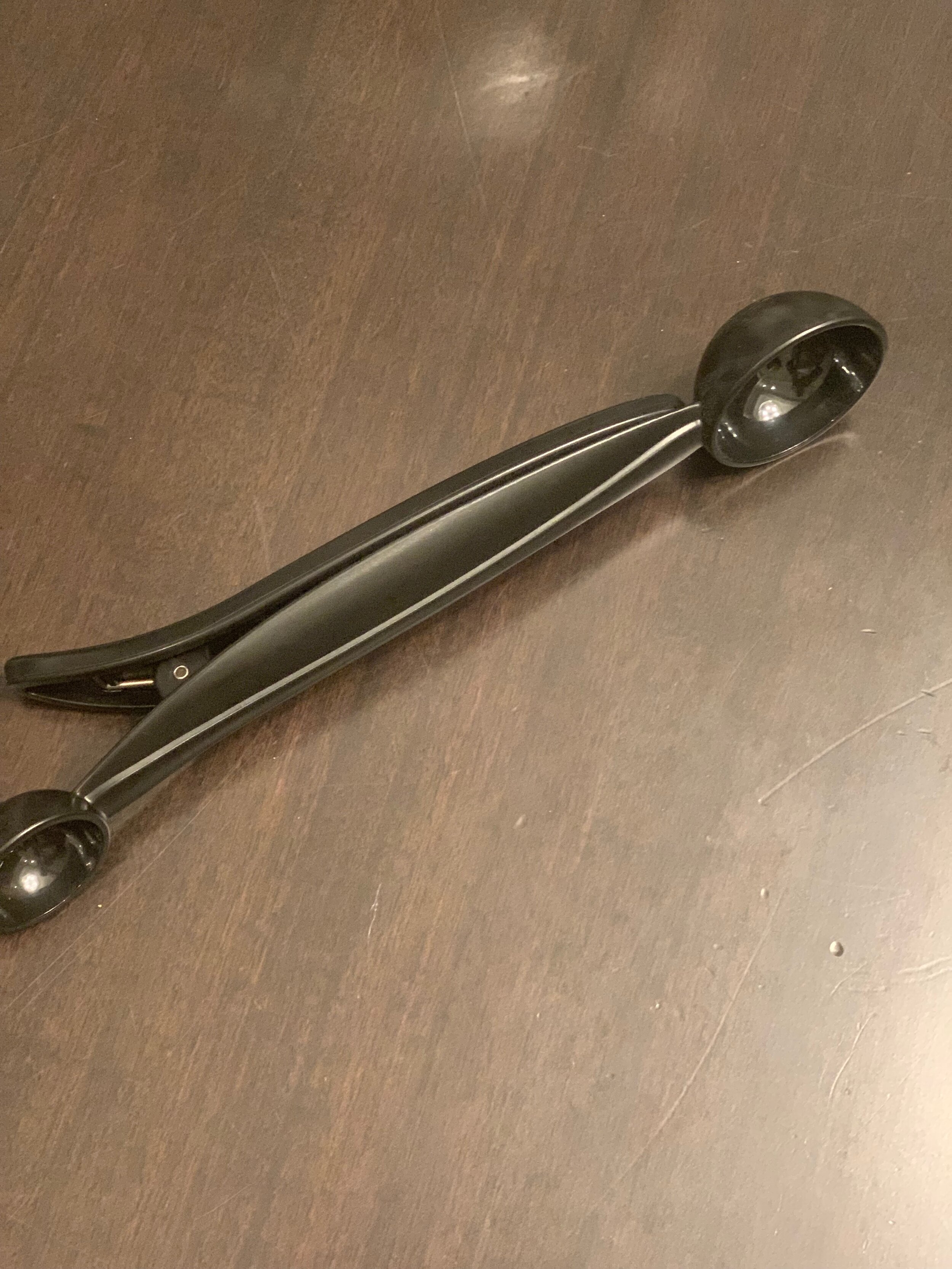 Another accessory - Pampered Chef Scooper. One spoon holds a teaspoon, the other a tablespoon and the clip keeps the coffee bag tightly sealed. See what I mean about necessity?