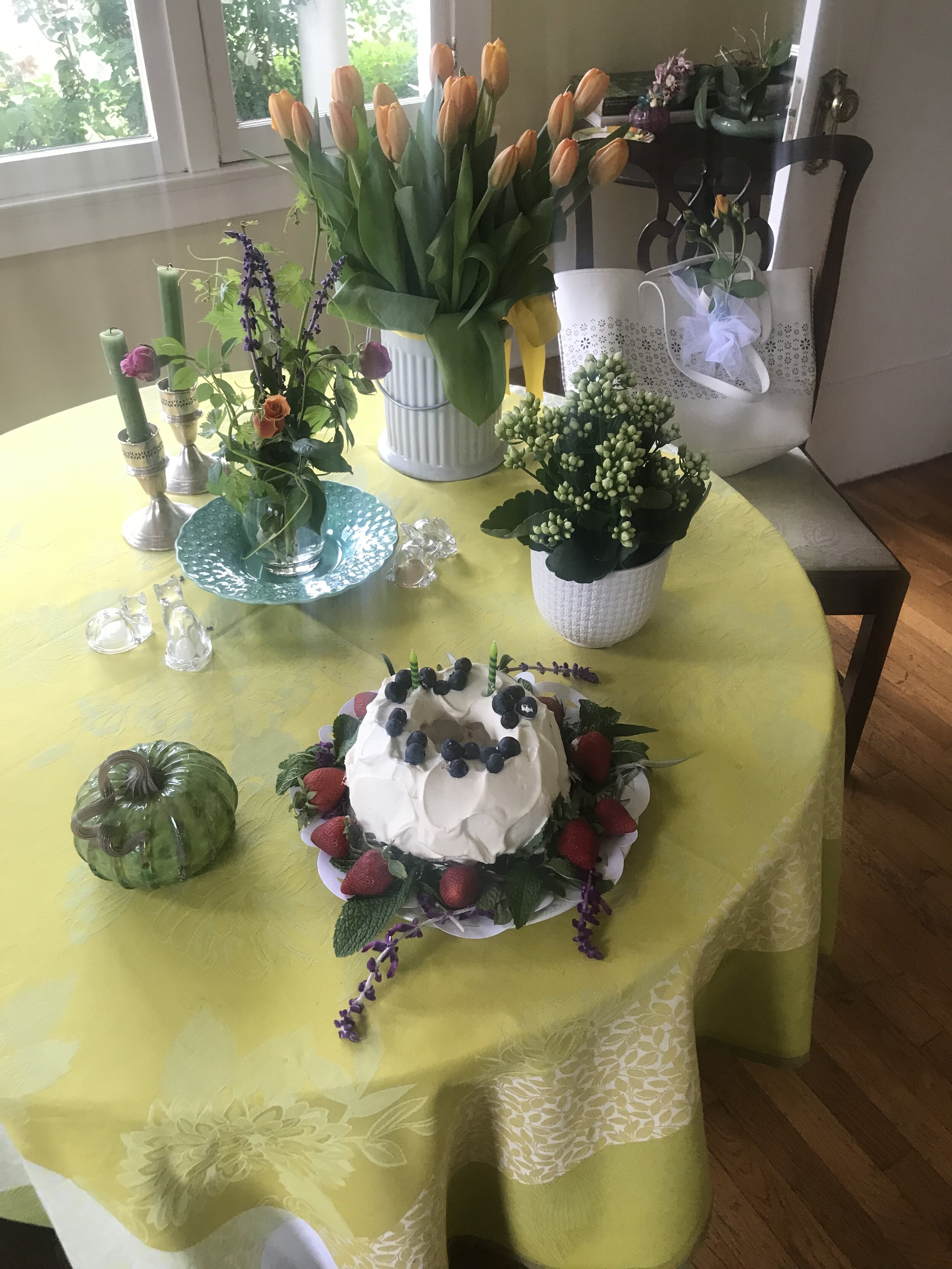 Carole uses fruit and herbs in her floral design to dress up food and brighten up the table.