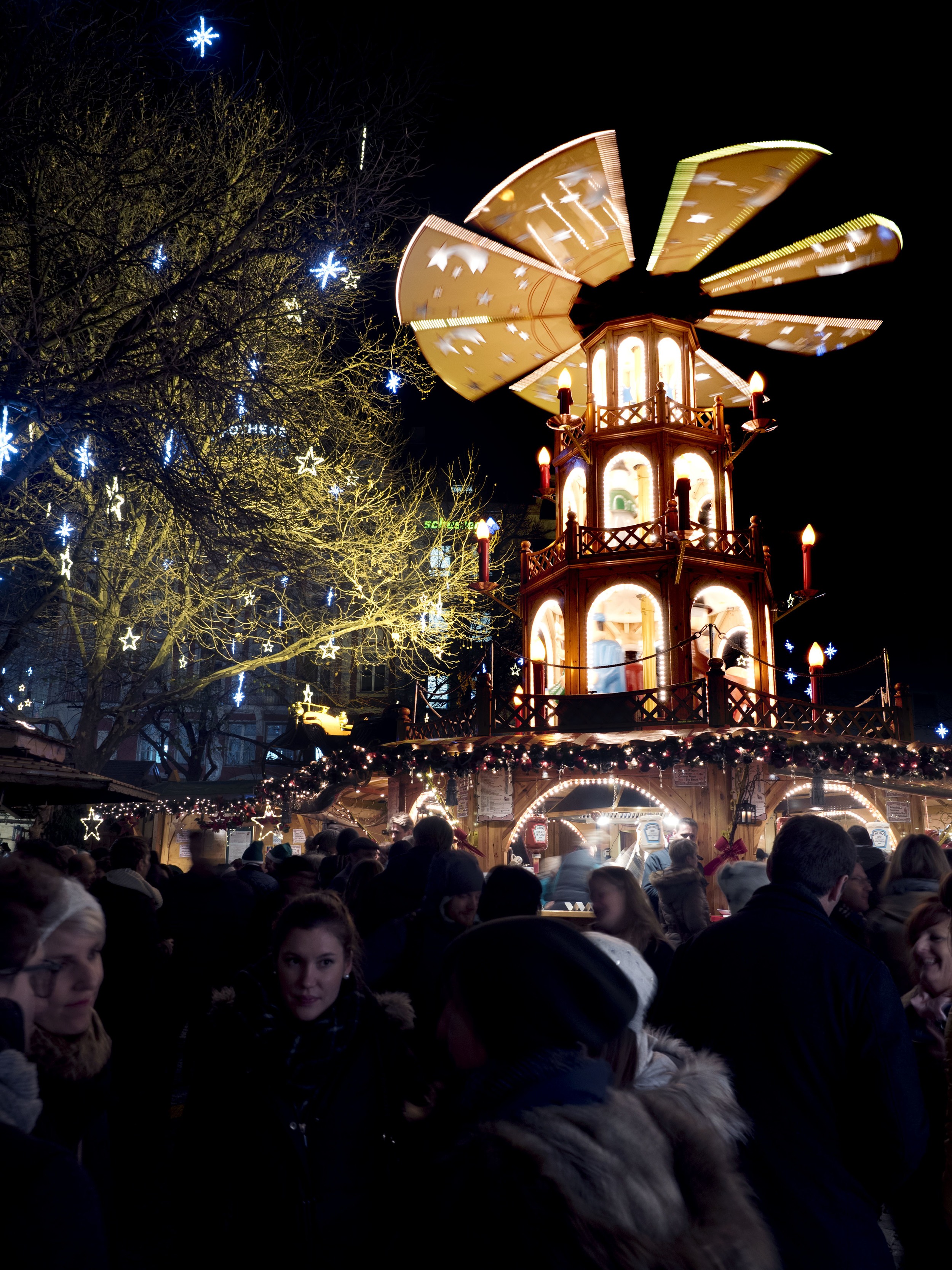  A German Christmas Pyramid. In the traditional version, the hot air rising from the candles hits the fan, which spins and moves the figures inside. This pyramid's figures are from the nativity story. Next year, we hope to get one of these for our ow