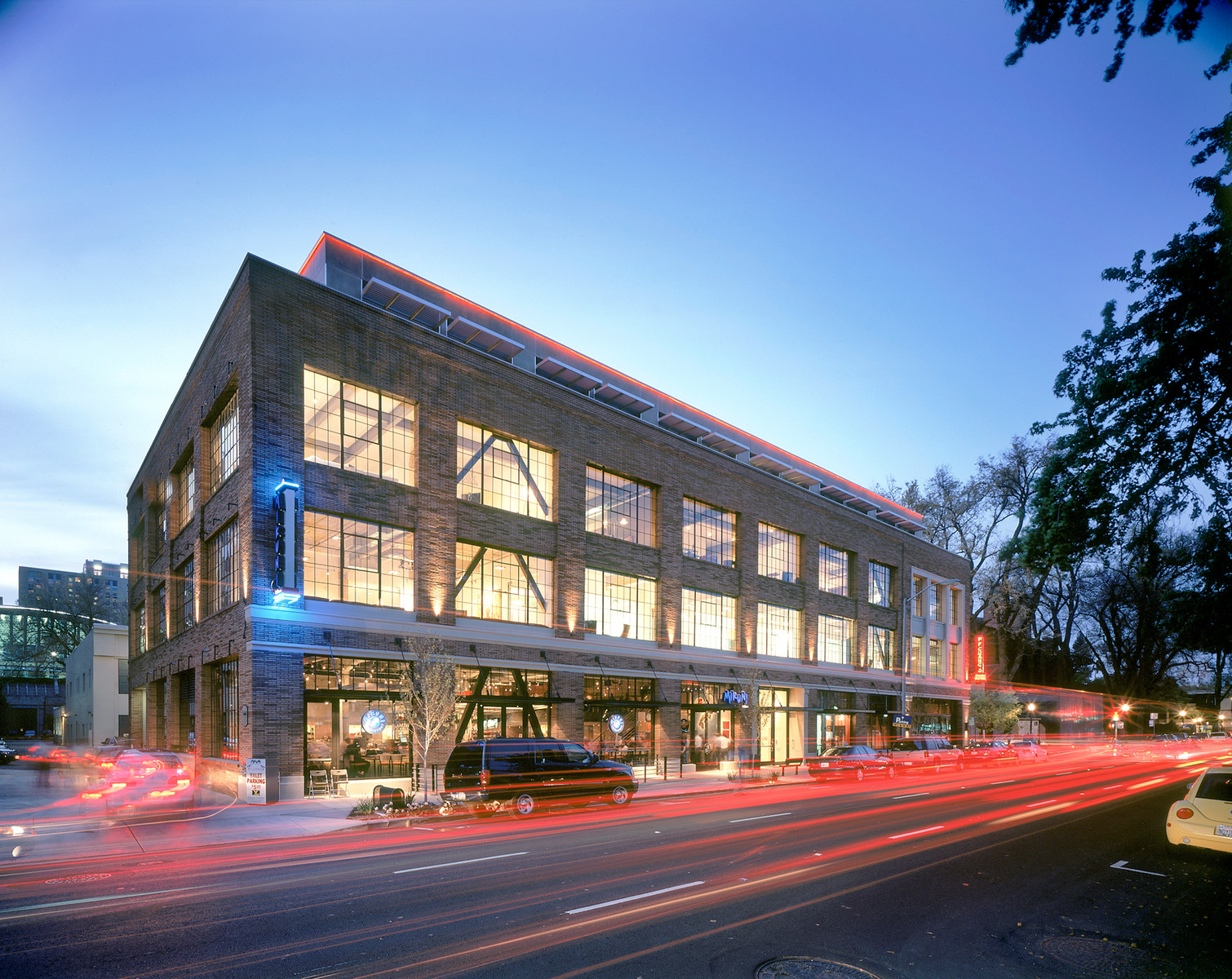 The historic Elliott Building, constructed in the 1920’s as an auto sales and service facility, was renovated and adapted to include three new uses on its three floors- restaurants, office, and lofts- with a new fourth floor added to rest lightly on the masonry base. The completed building has re-energized the district, and is now home to Governor Jerry Brown.
