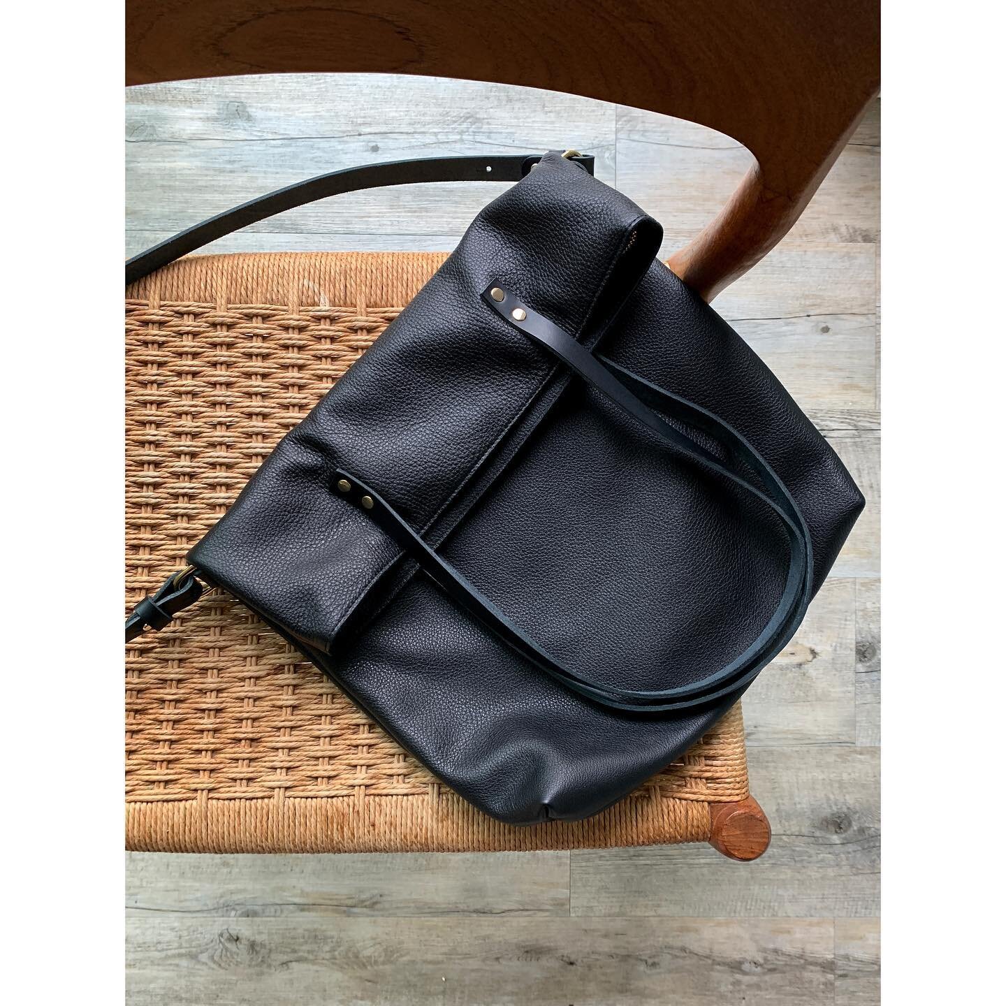 BACK IN STOCK: the black + gold variant of our &bdquo;M crossbody&ldquo;.
Made with finest, soft and warm grainleather from Scandinavia. 
You can order it with a complete zipper or without. All bags have a cotton inner lining and an inner pocket with