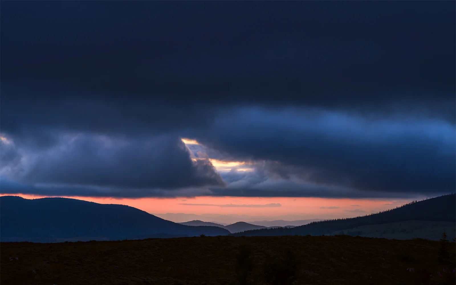 Taken looking the opposite direction of Mount St Helens. Got some nice stormy looking clouds at sunset as consulation for the clouds covering up the St Helens crater.
