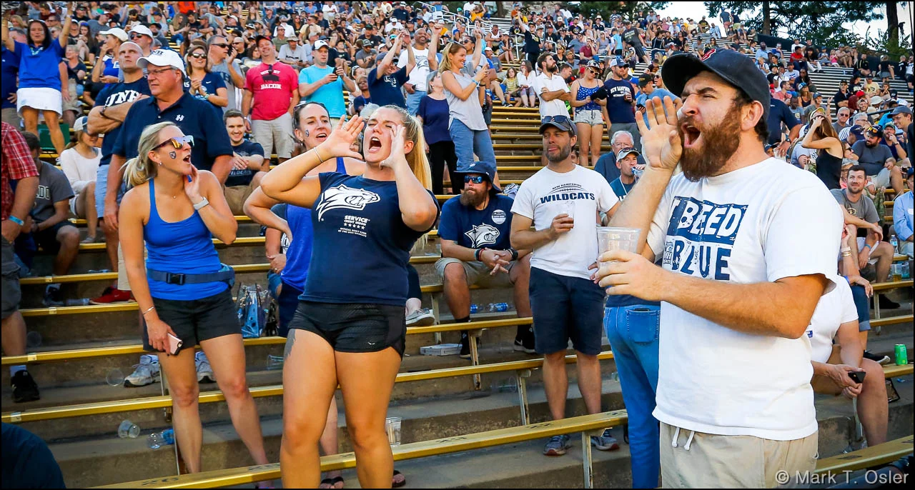 UNH fans holler in support of their trailing Wildcats late in the third quarter. UNH had just narrowed the score to 38-14.