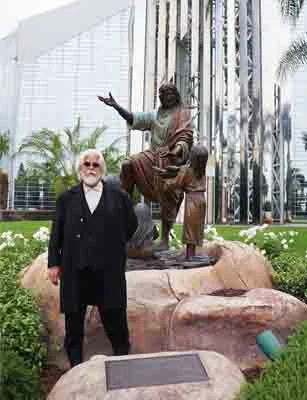 Soderberg and his monumental bronze sculpture in front of Crystal Cathedral in Southern California
