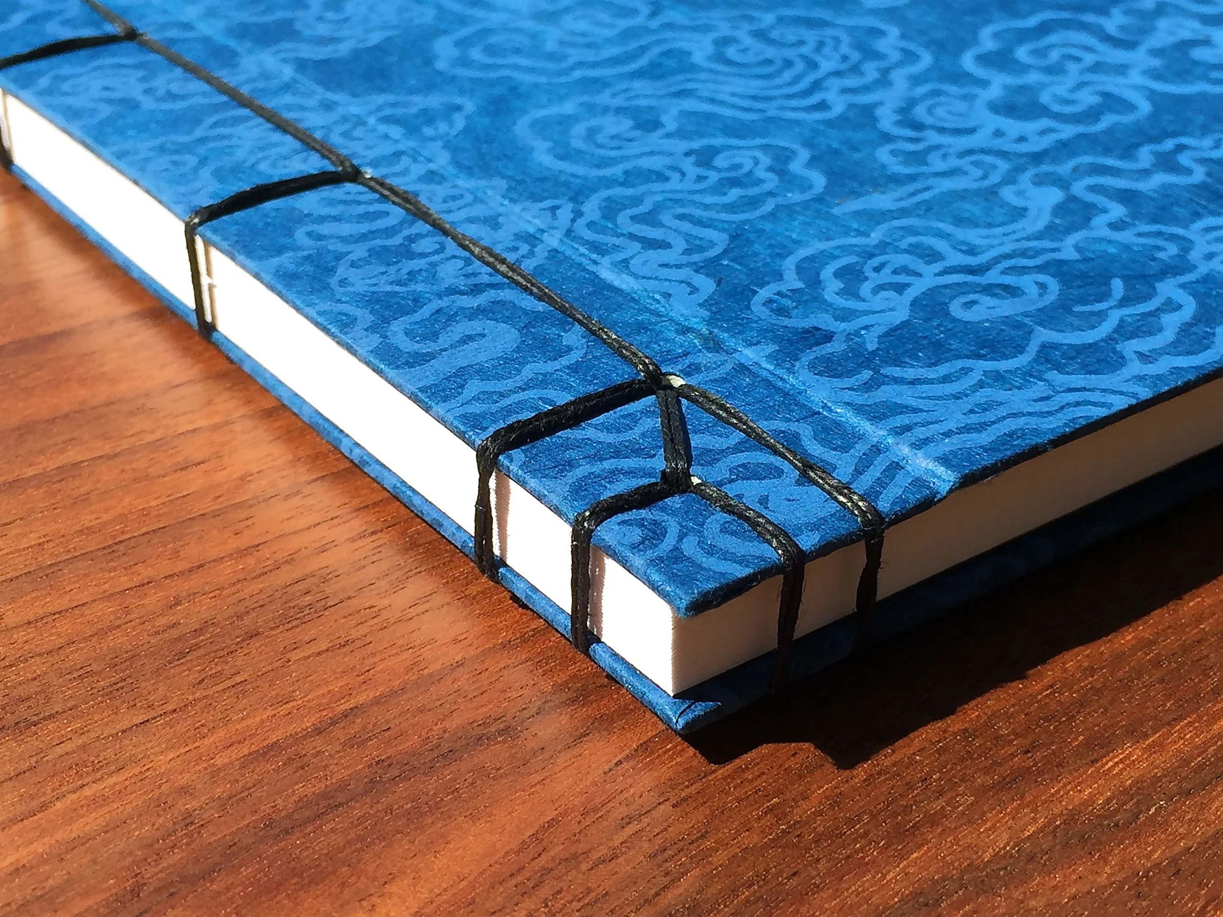 "Kangxi," an elegant side-bound pattern from 16th century China.