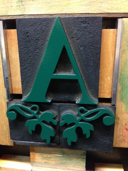 We print a LOT of things in green... Here, on some gorgeous antique wood type.
