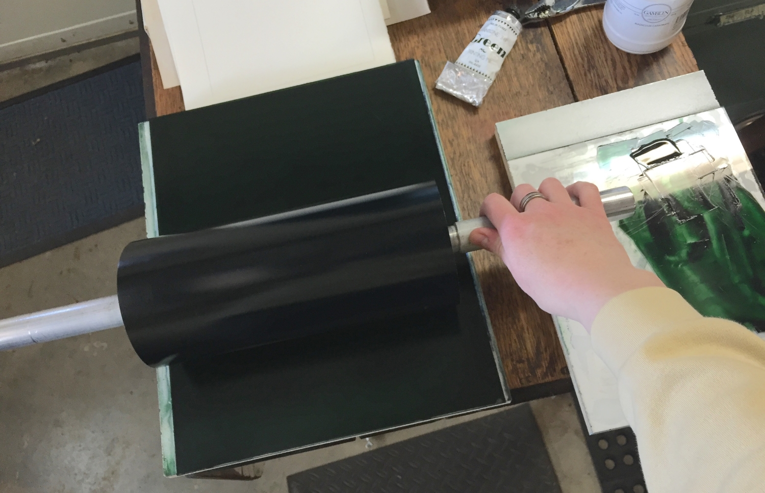 Next, we charge the roller with ink...