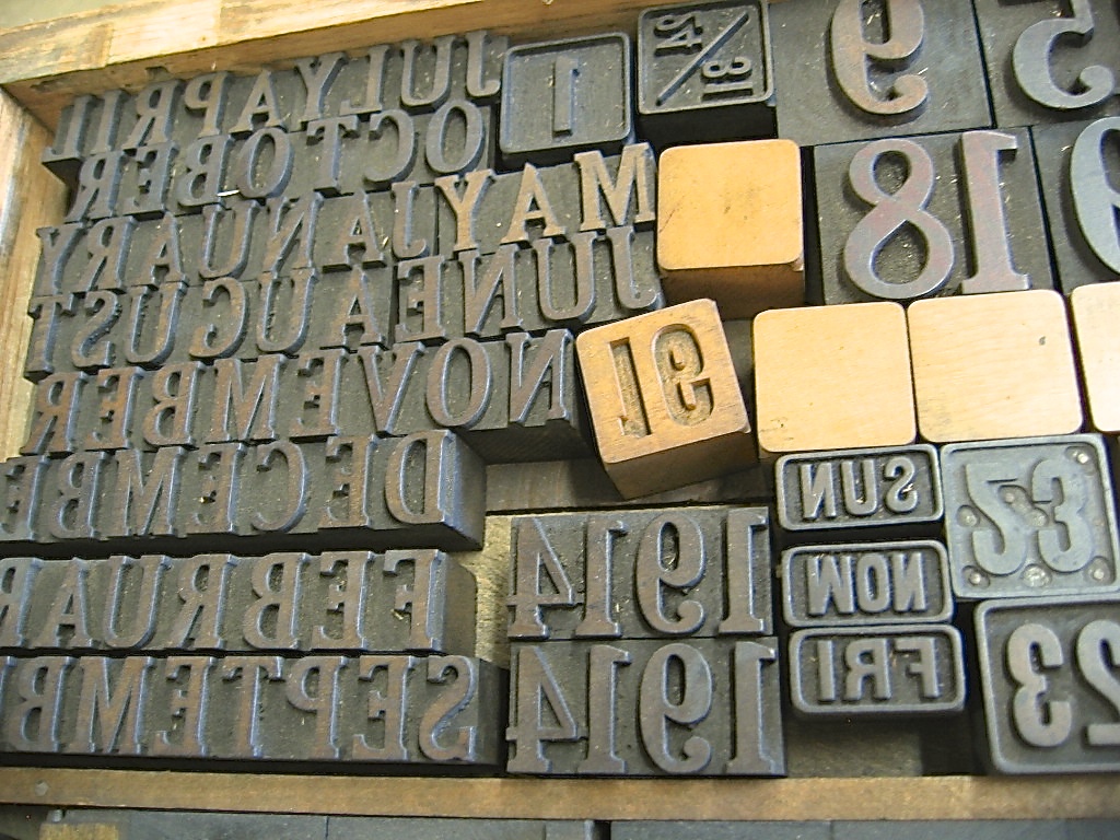 Also in our collection, a wonderful old wood calendar set, with days of the week, numbers, and months. The year is 1914.