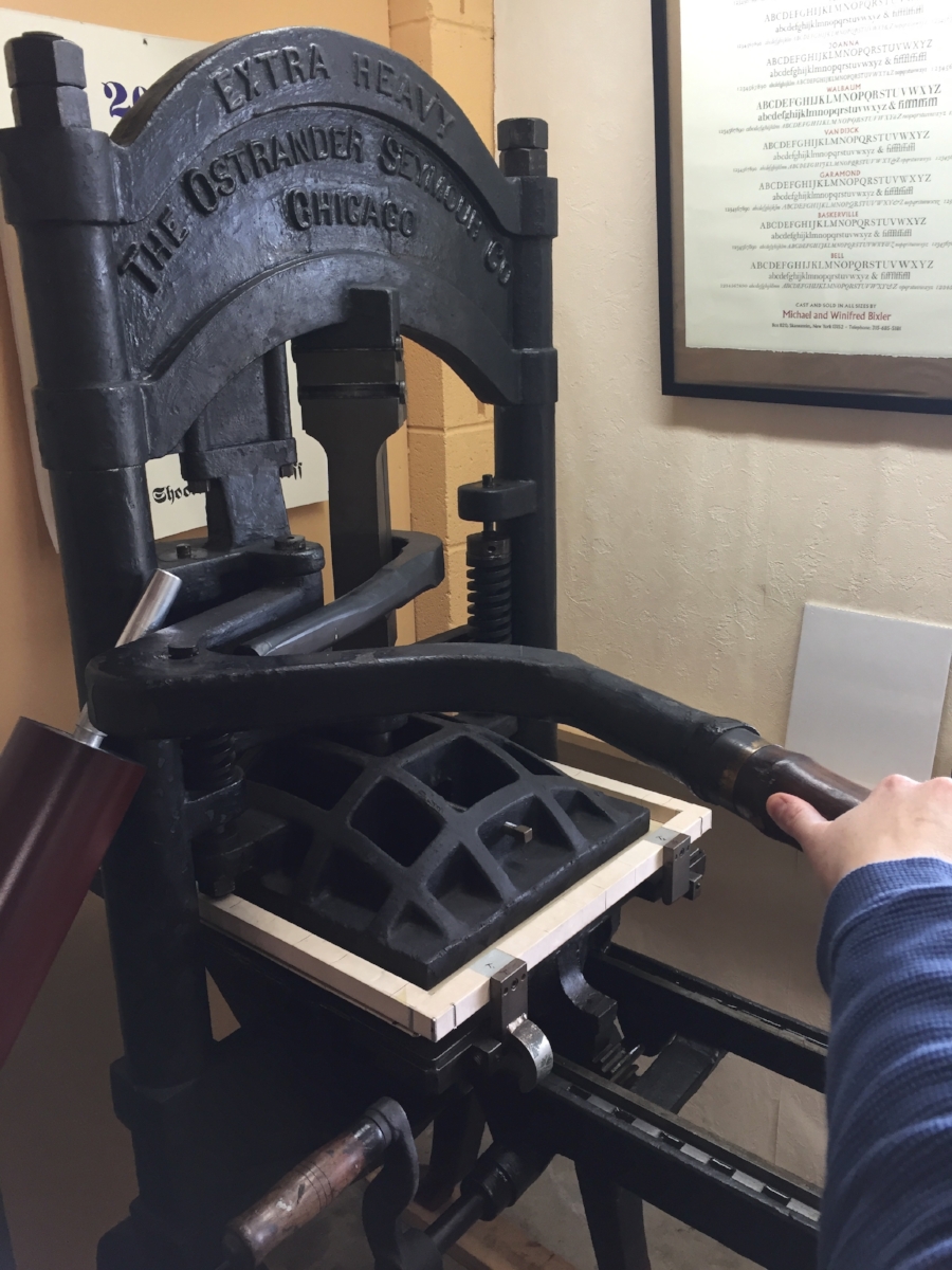  Now we pull the bar ~ this lowers the platen onto the tympan, etc., which presses the paper into the inked type! 