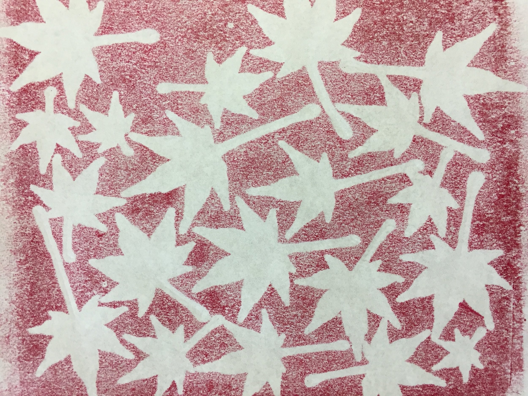  When I peeled back the copy paper, the underside had this cool pattern. The leaves on the ink plate were now ready to be transferred to the book page. 