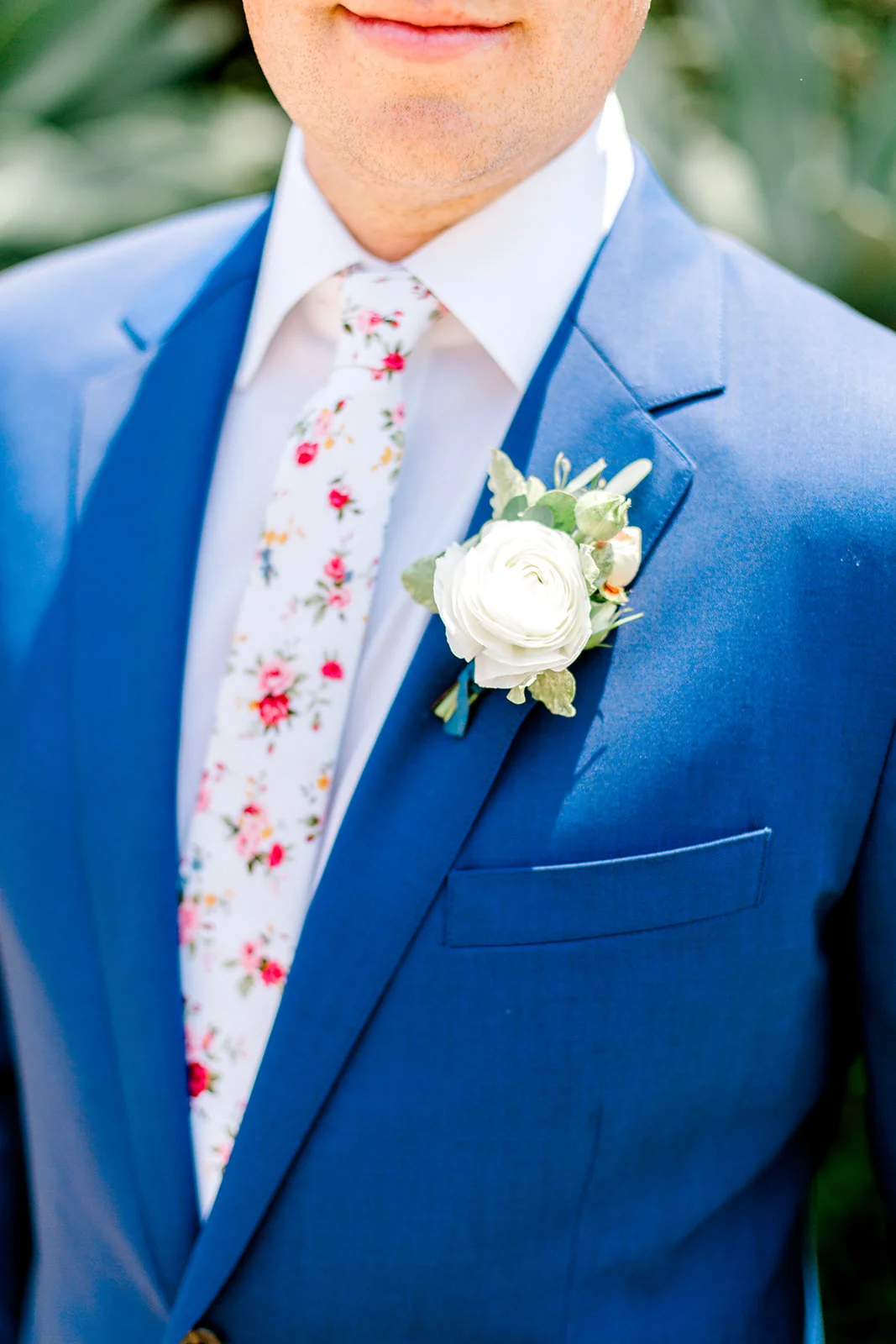 Haute-Blossoms-Groom's-Boutionniere-Blue-Suit.jpg